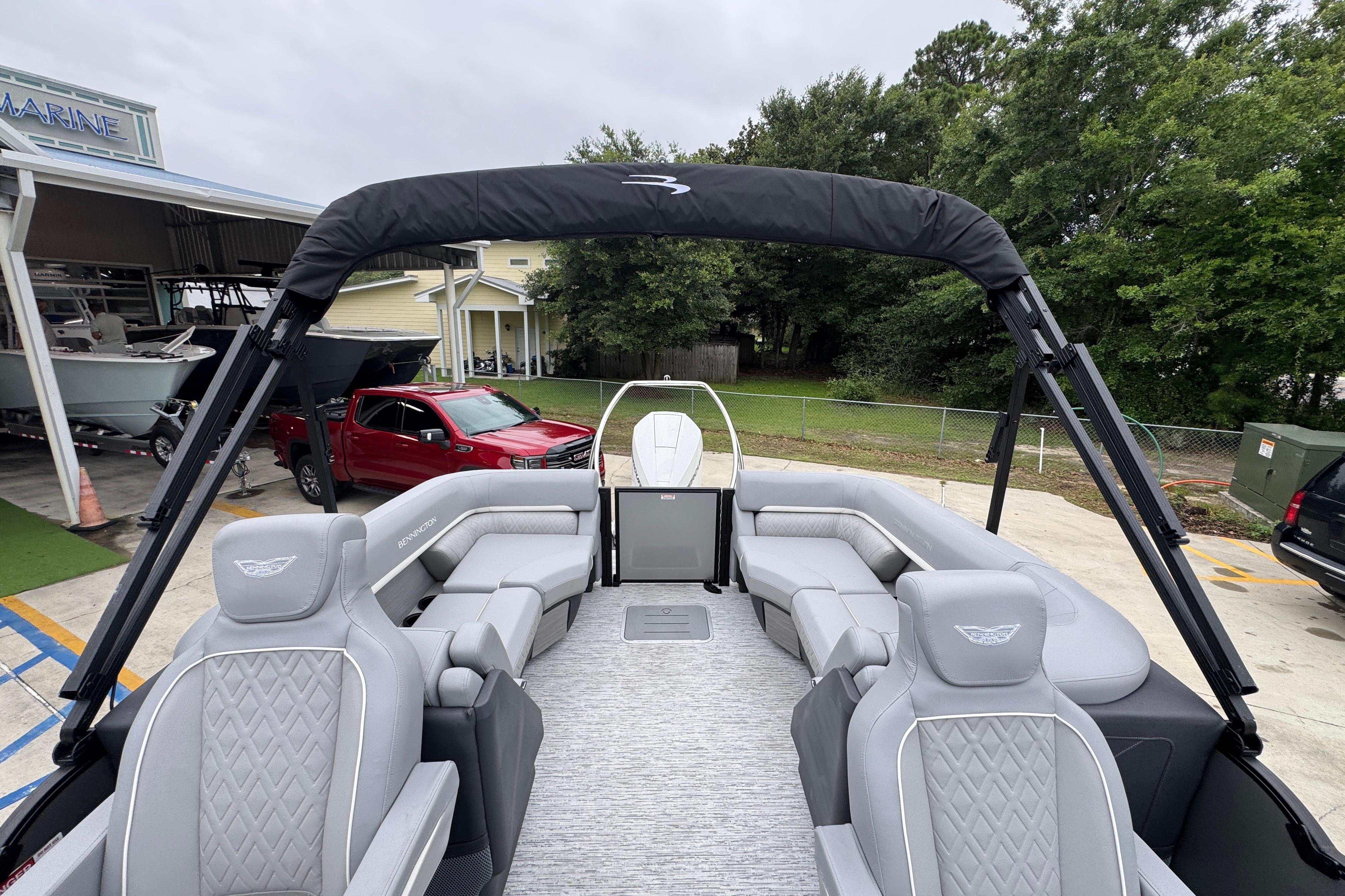 2027 Bennington 24 MFB pontoon boat with luxurious seating and sleek design.