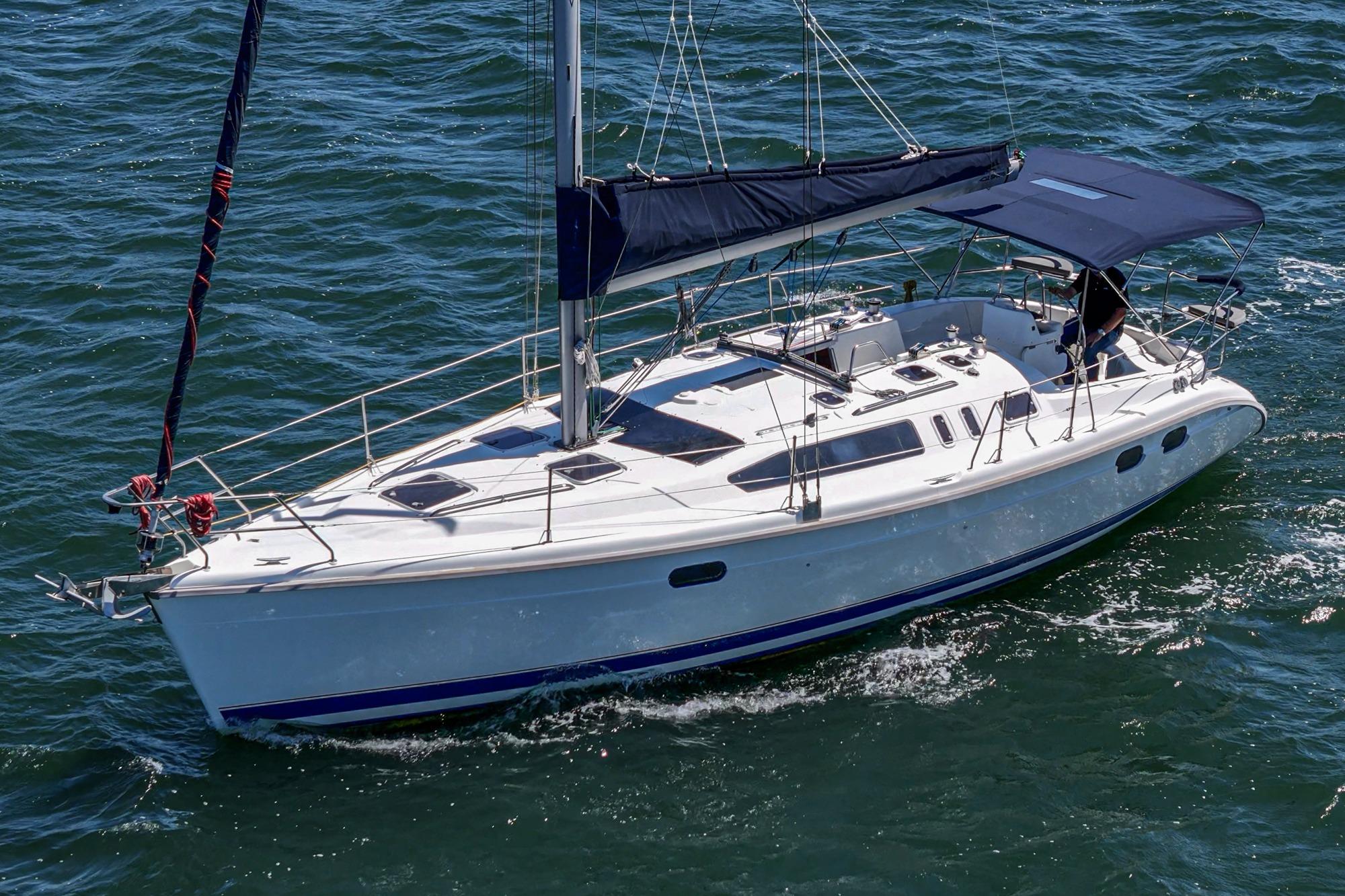 Sailing yacht Hunter 376, 1996 model, cruising on open water.