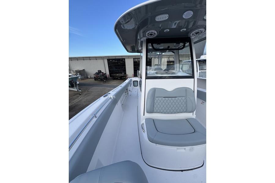 2026 Sportsman Open 282 Center Console boat with sleek seating and modern design.