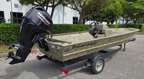 2025 Tracker Grizzly 1648 SC boat with Mercury engine on trailer.