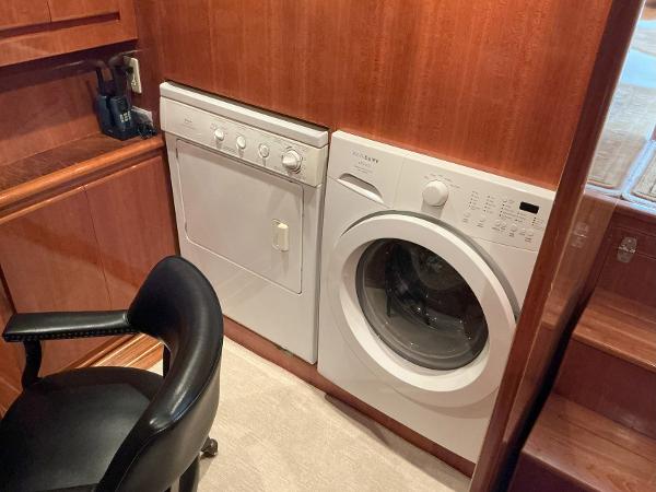 Laundry area in 2000 Novatec Islander 55 yacht with washer and dryer.