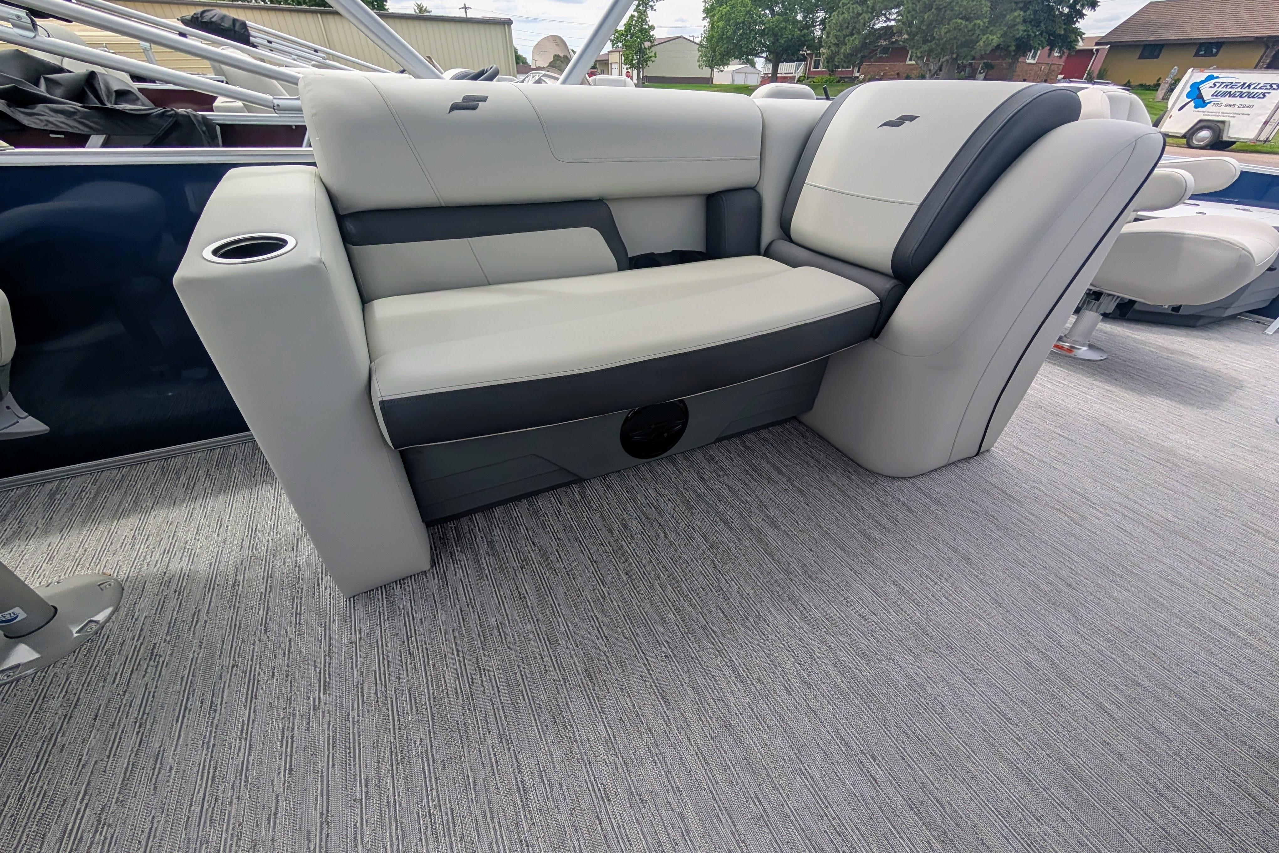 2026 Starcraft EX 20 F boat interior with gray seating and cup holder.