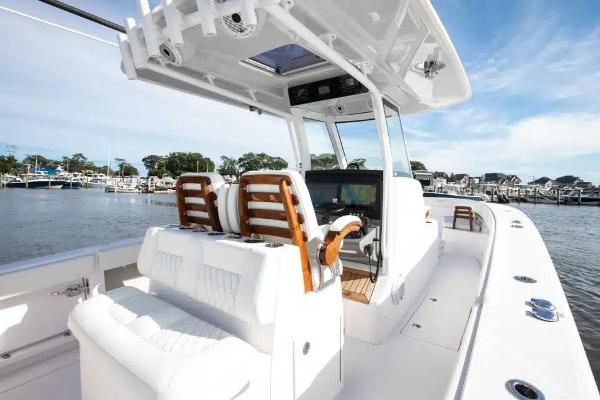 Manufacturer Provided Image: 2026 Jupiter 340LS boat with sleek design, luxurious seating, and advanced navigation system.
