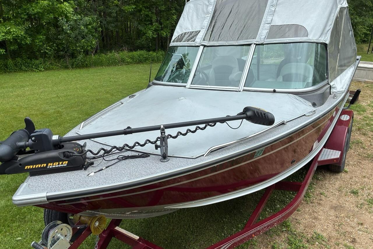2016 Alumacraft Trophy 205 Sport boat on trailer with Minn Kota trolling motor.