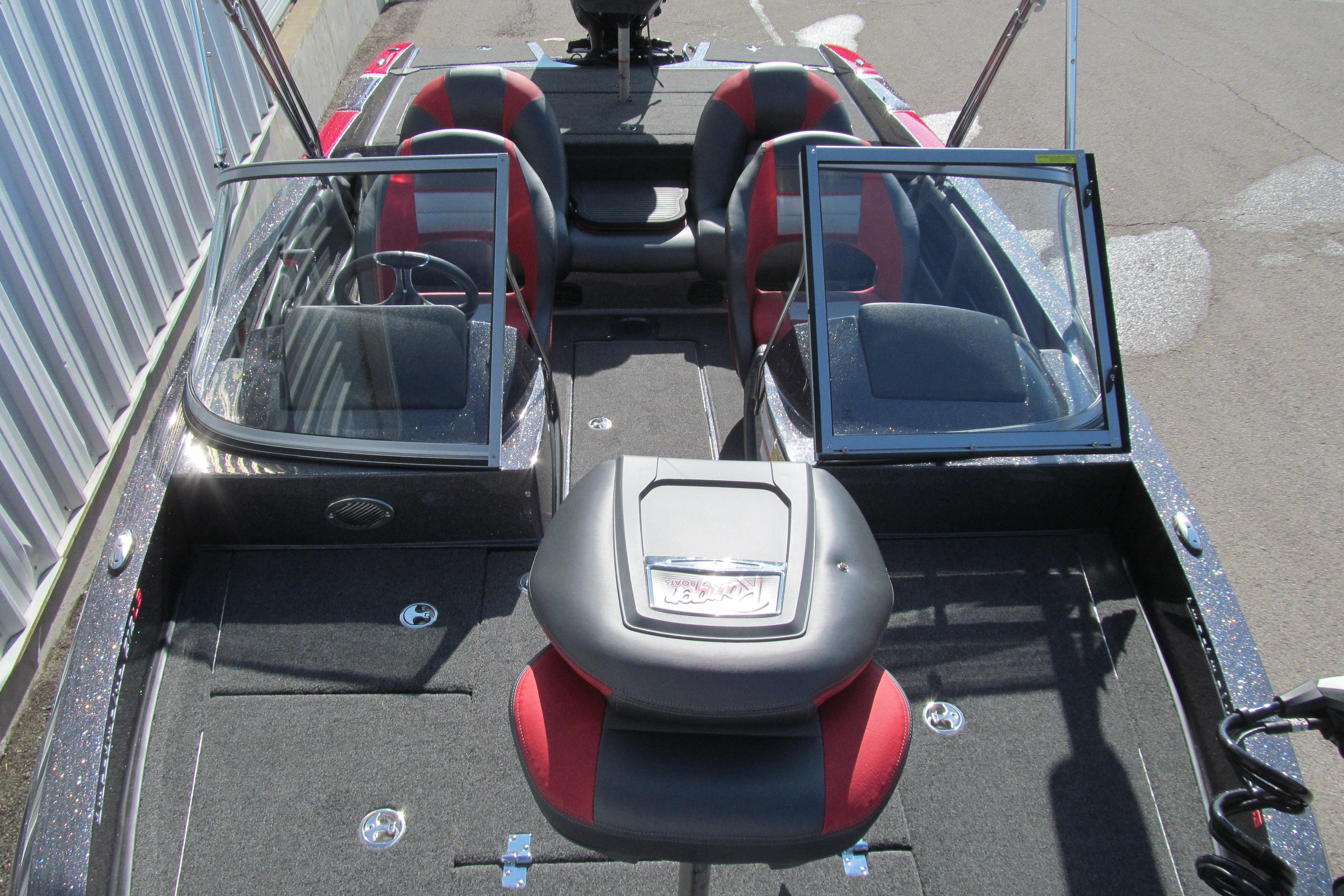2026 Ranger 212LS boat interior with red and black seating, open windshield, and spacious deck.