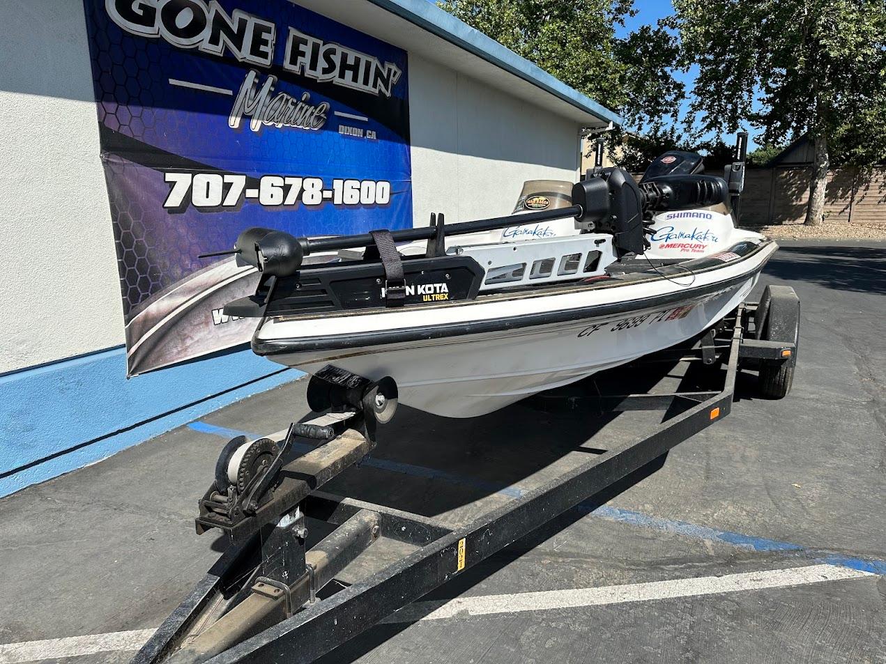 1999 Fisher 21 FX DC boat on trailer at Gone Fishin' Marine dealership.