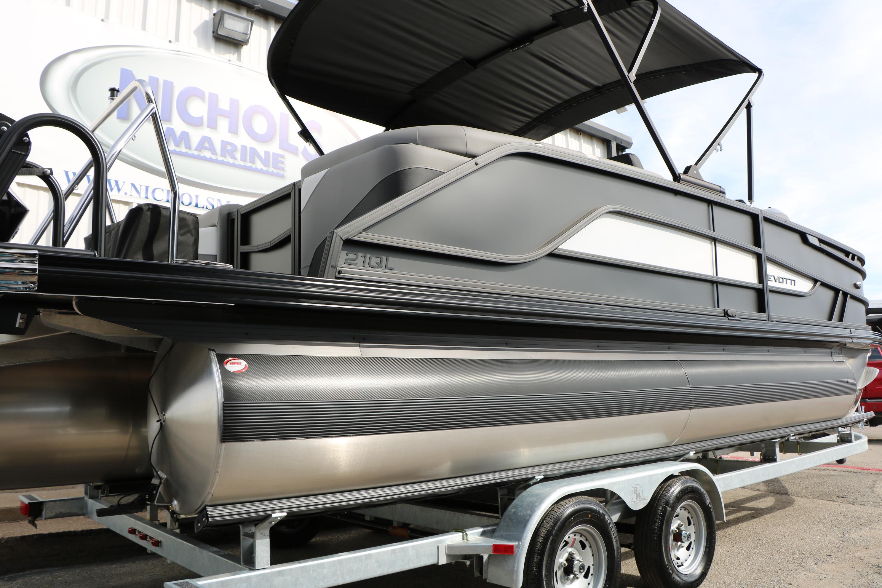 2026 Evotti 521QL pontoon boat on trailer at Nichols Marine dealership.