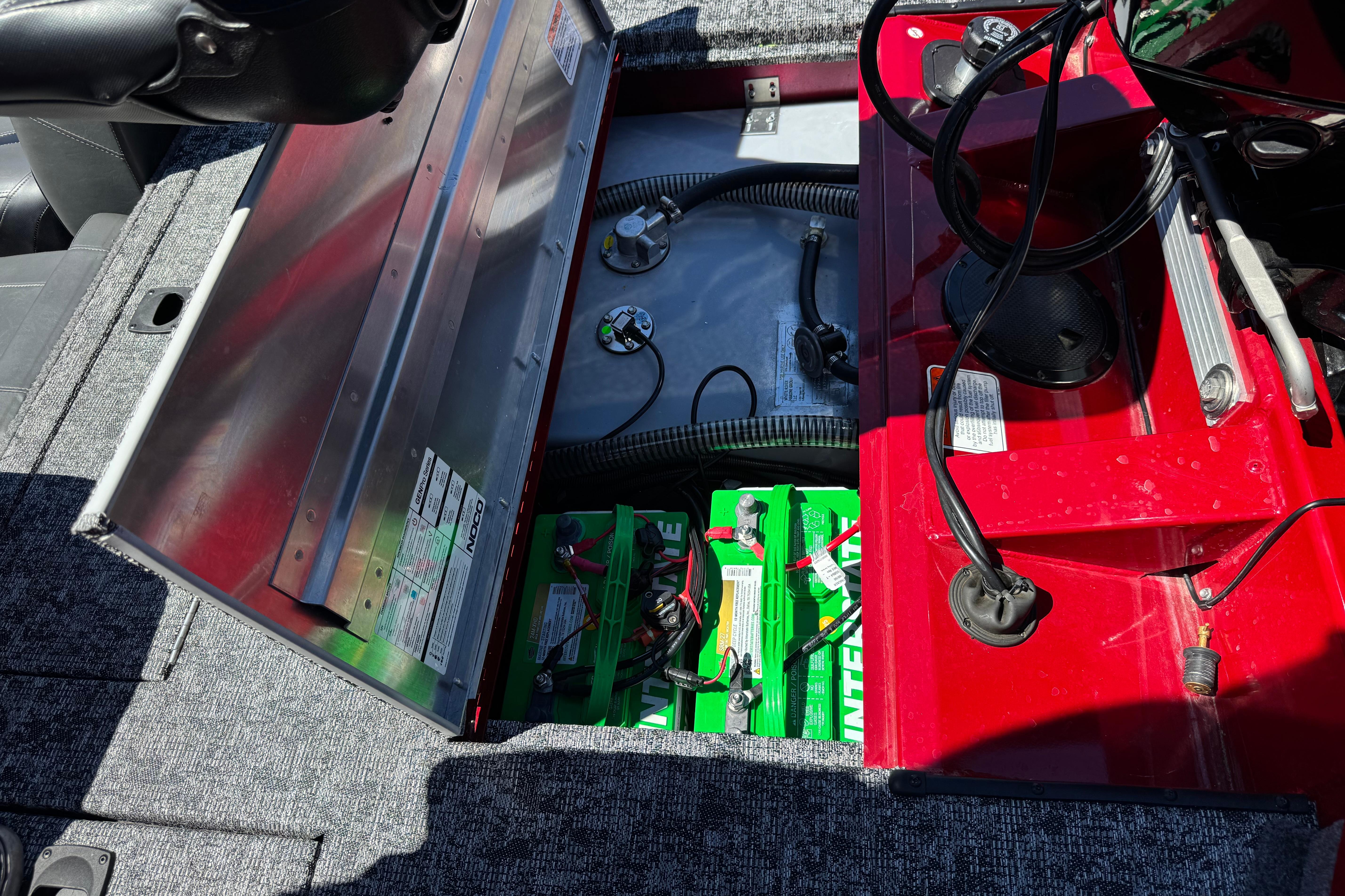 2025 Tracker Pro Team 175 TXW boat battery compartment with wiring and components.