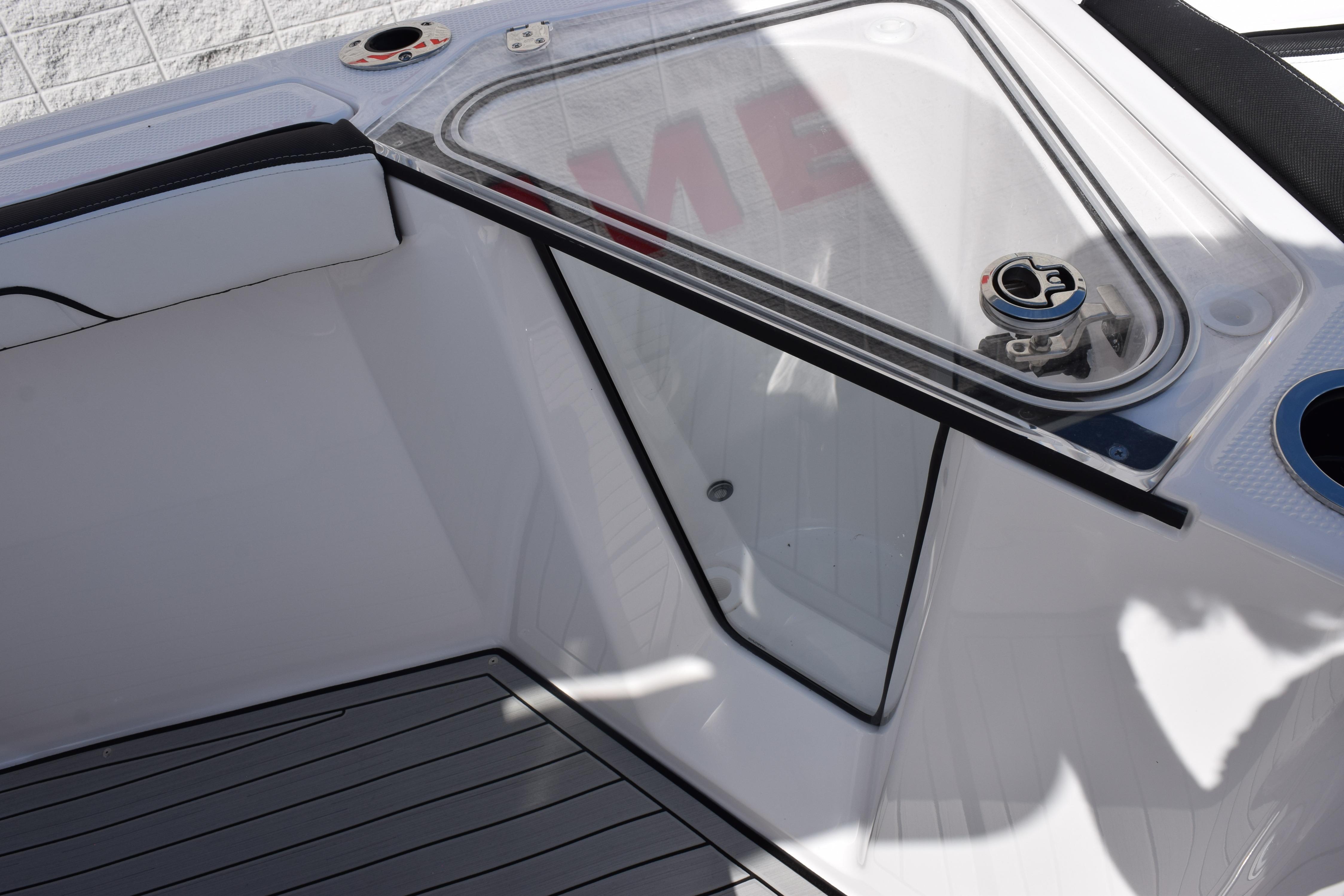 Interior view of 2026 Yamaha Boats 255 FSH Sport H, featuring sleek seating and deck design.