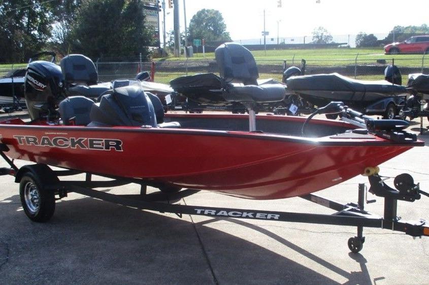 2026 Tracker Pro Team 175 boat in vibrant red on a trailer.
