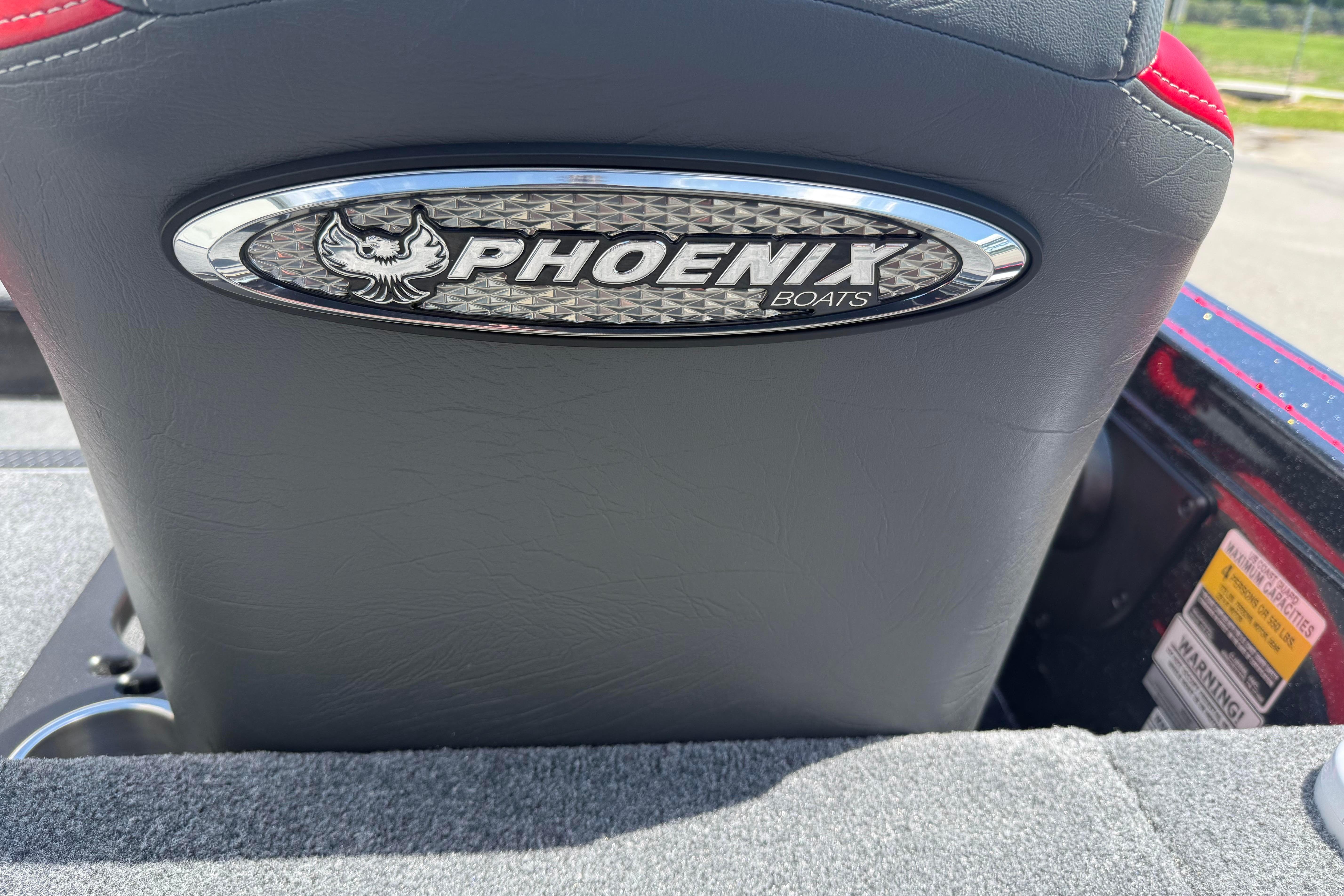 Phoenix 919 ZXL boat seat with logo, 2027 model, featuring sleek design and branding.