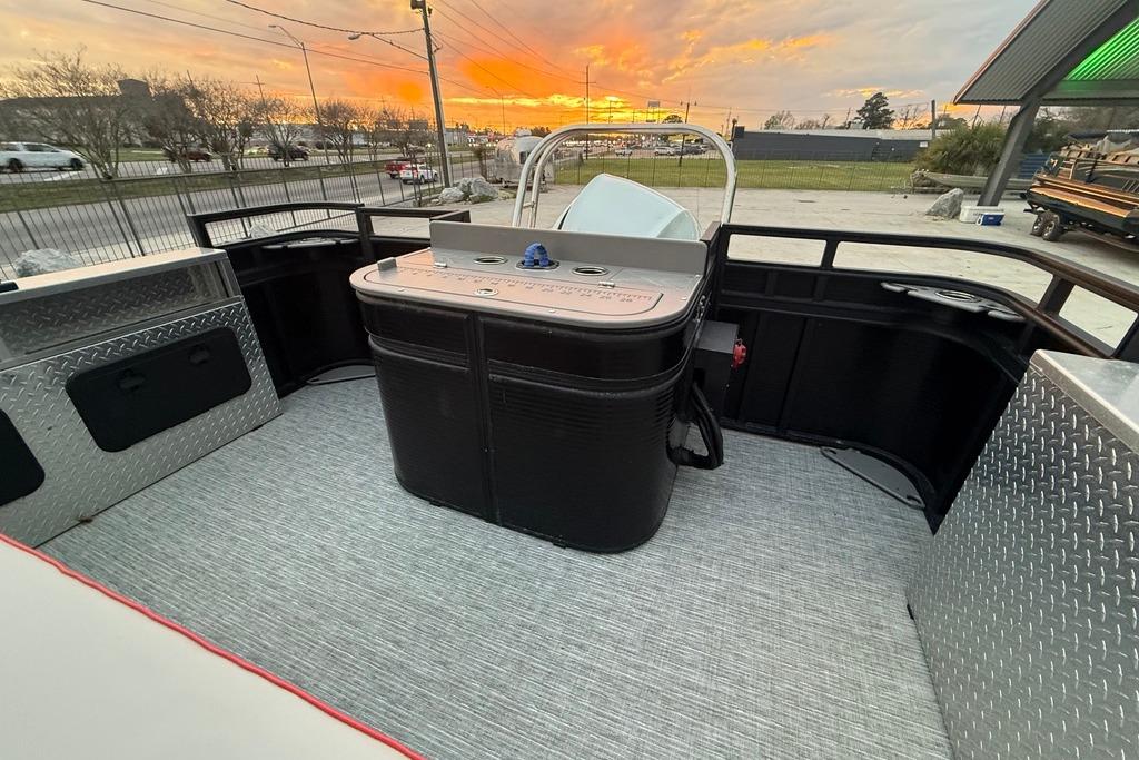 2022 Apex Marine 8524 Pro Fish N Cruise boat interior at sunset.
