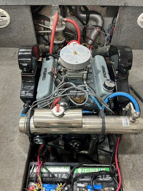 1986 custom jet boat engine with visible wiring and components.