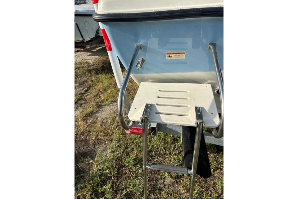 Rear view of 2005 Hydra-Sports Lightning 180 CC boat with ladder and platform.