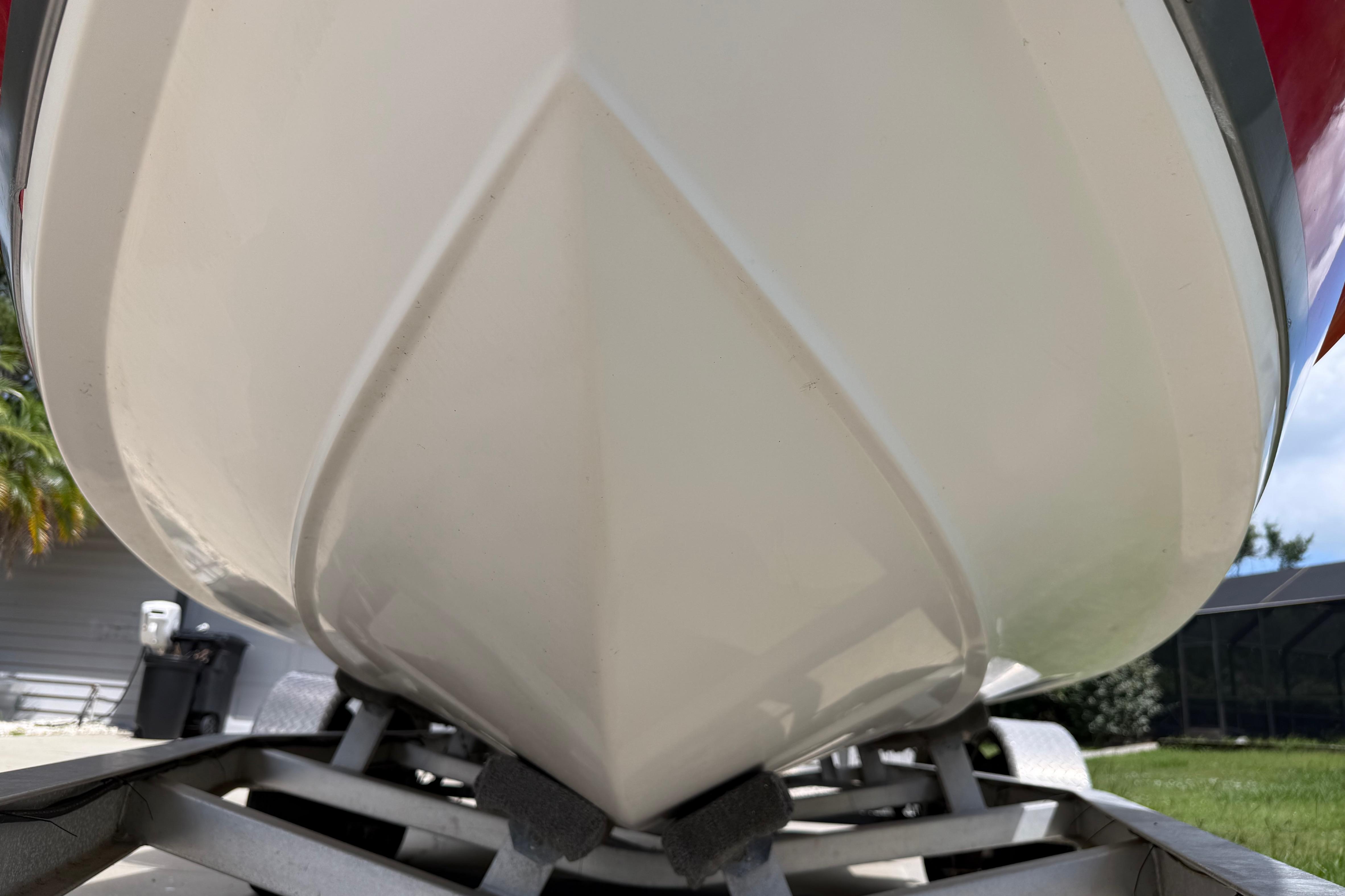 Close-up of a 2012 Clearwater 2000 Center Console boat hull on a trailer.