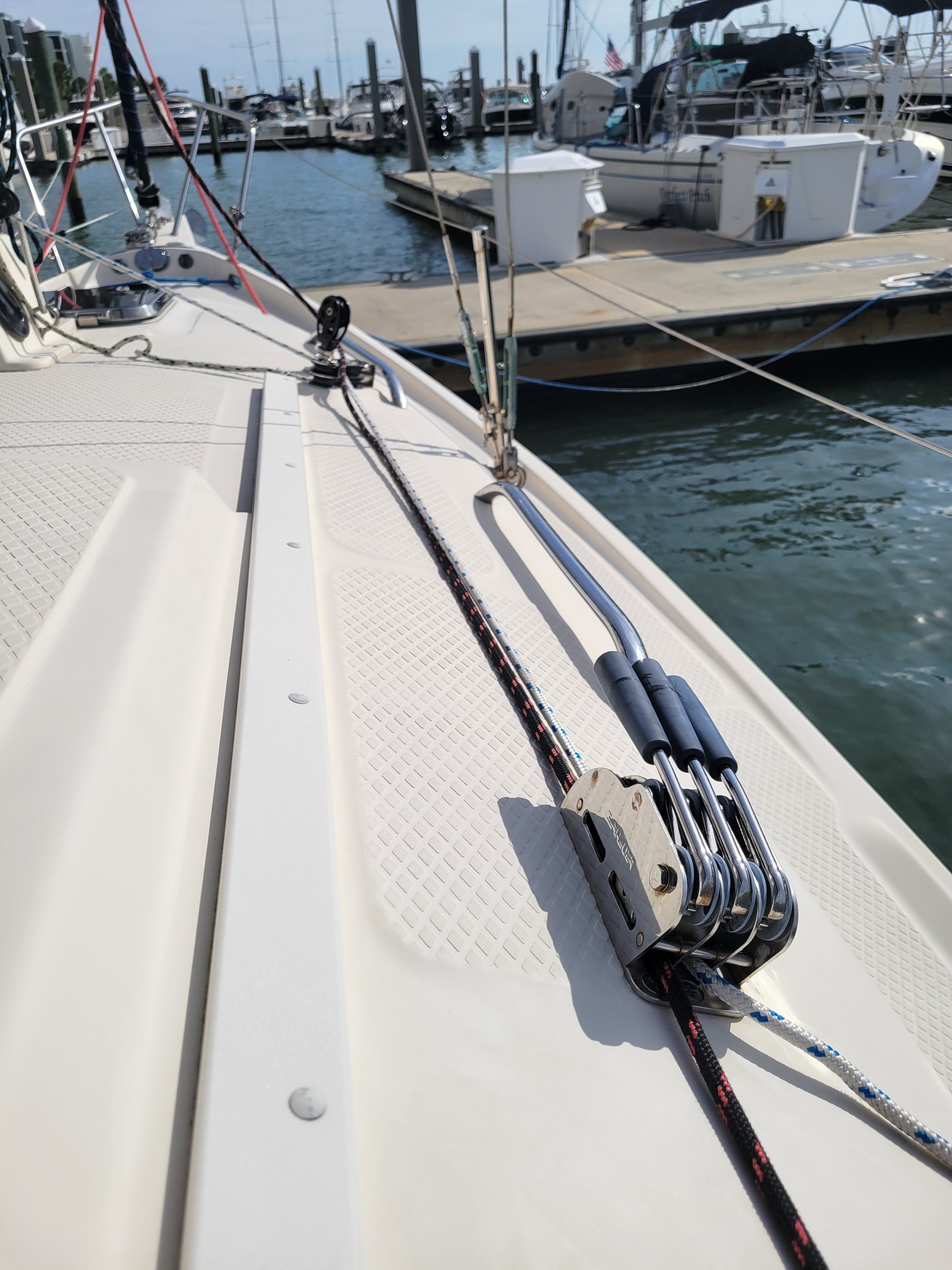 2018 Hake Seaward 26 RK sailboat docked in marina.