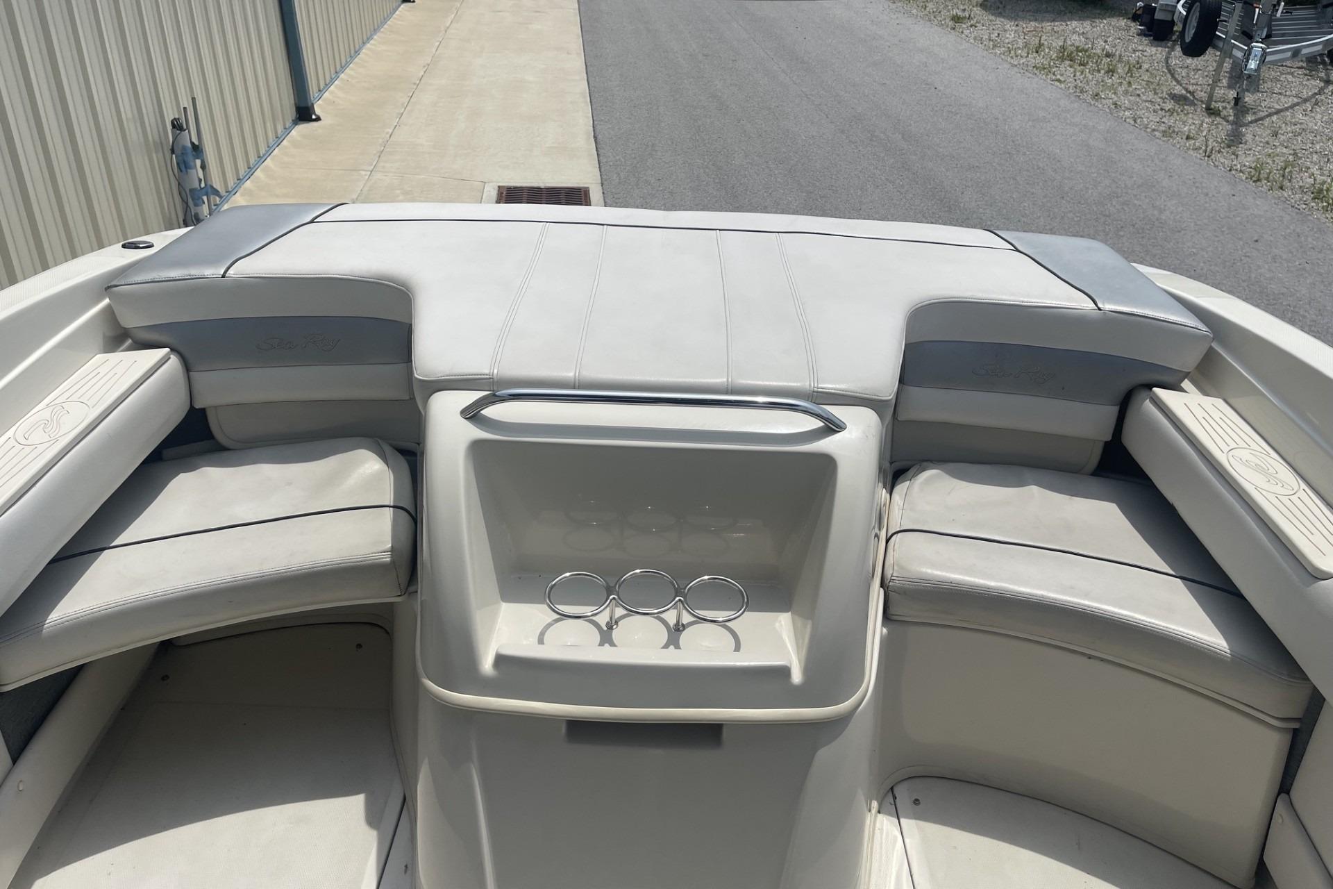 2010 Sea Ray 230 Bow Rider Select boat interior with seating and cup holders.
