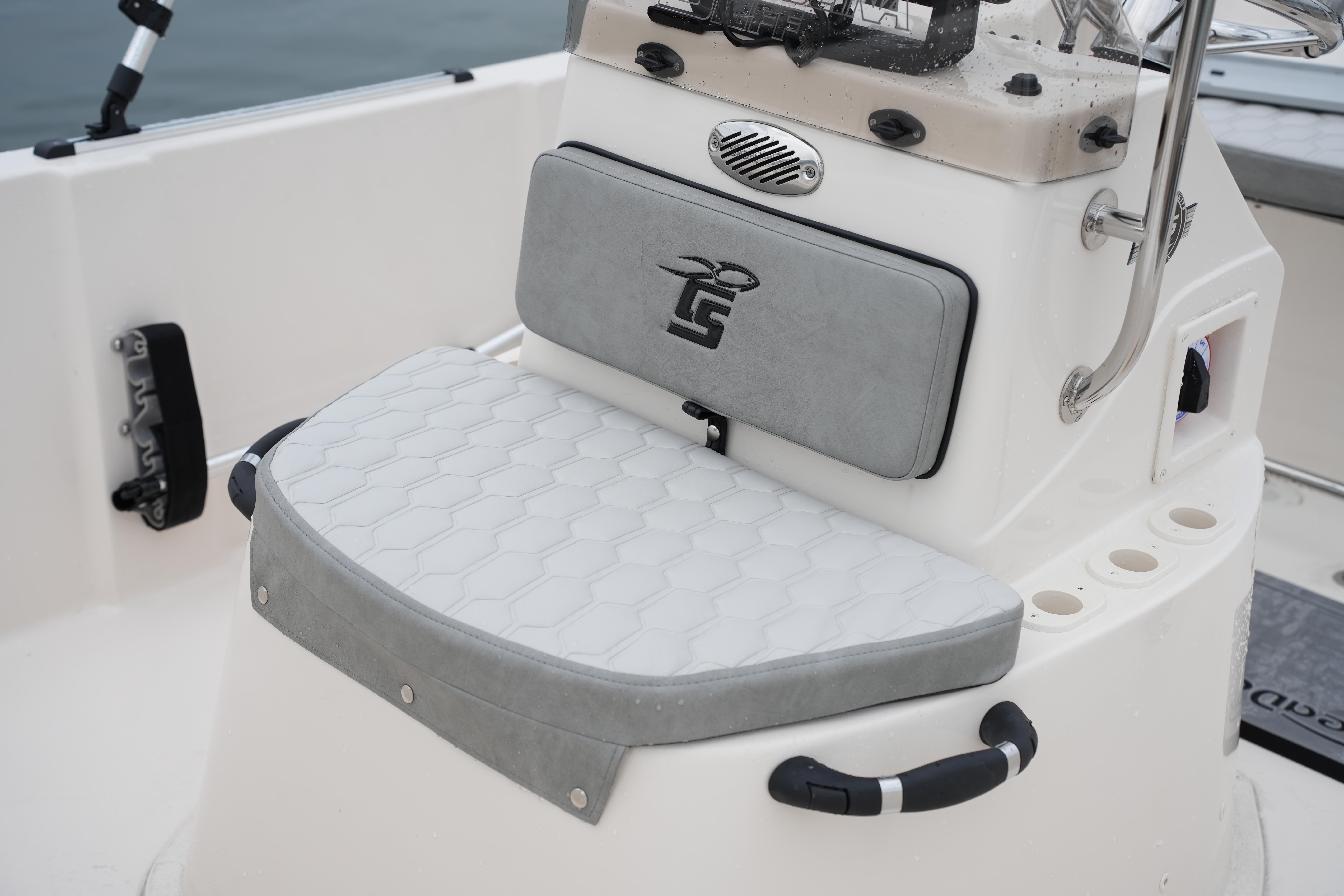 2025 Carolina Skiff 162 JLS boat seat with gray cushion and console details.