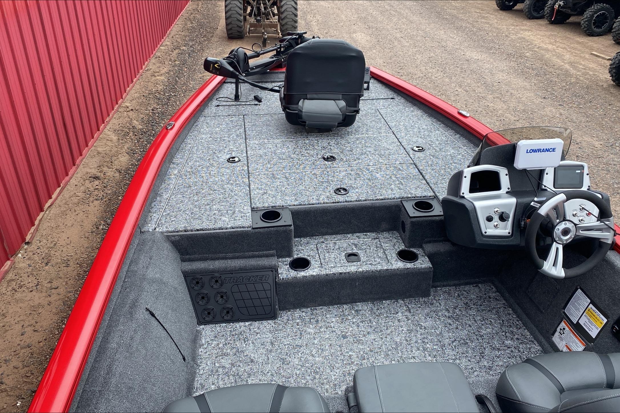 2026 Tracker Pro Team 195 boat interior with steering console and seating.