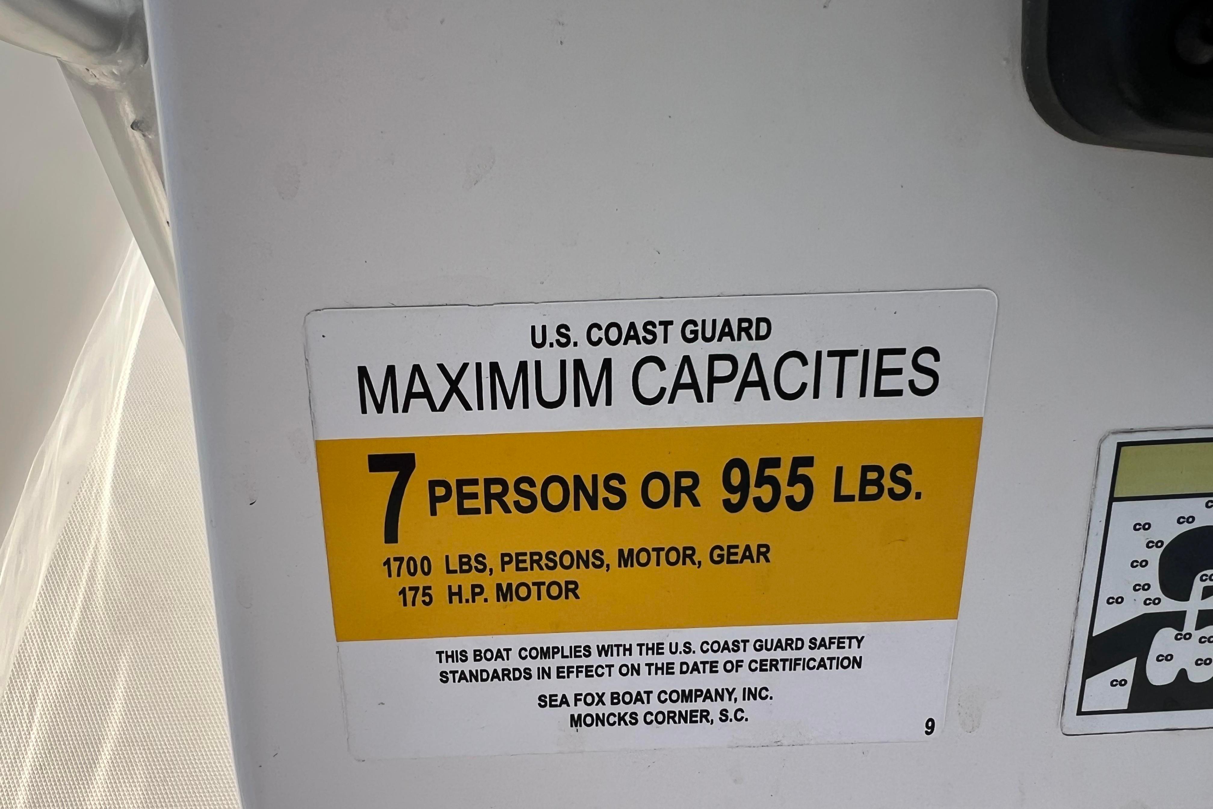 2012 Sea Fox 206 Center Console capacity label: 7 persons or 955 lbs, 175 HP motor.
