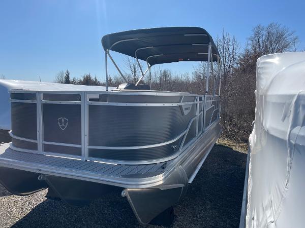 2025 Armada Saphir 23CR pontoon boat with canopy, parked outdoors.