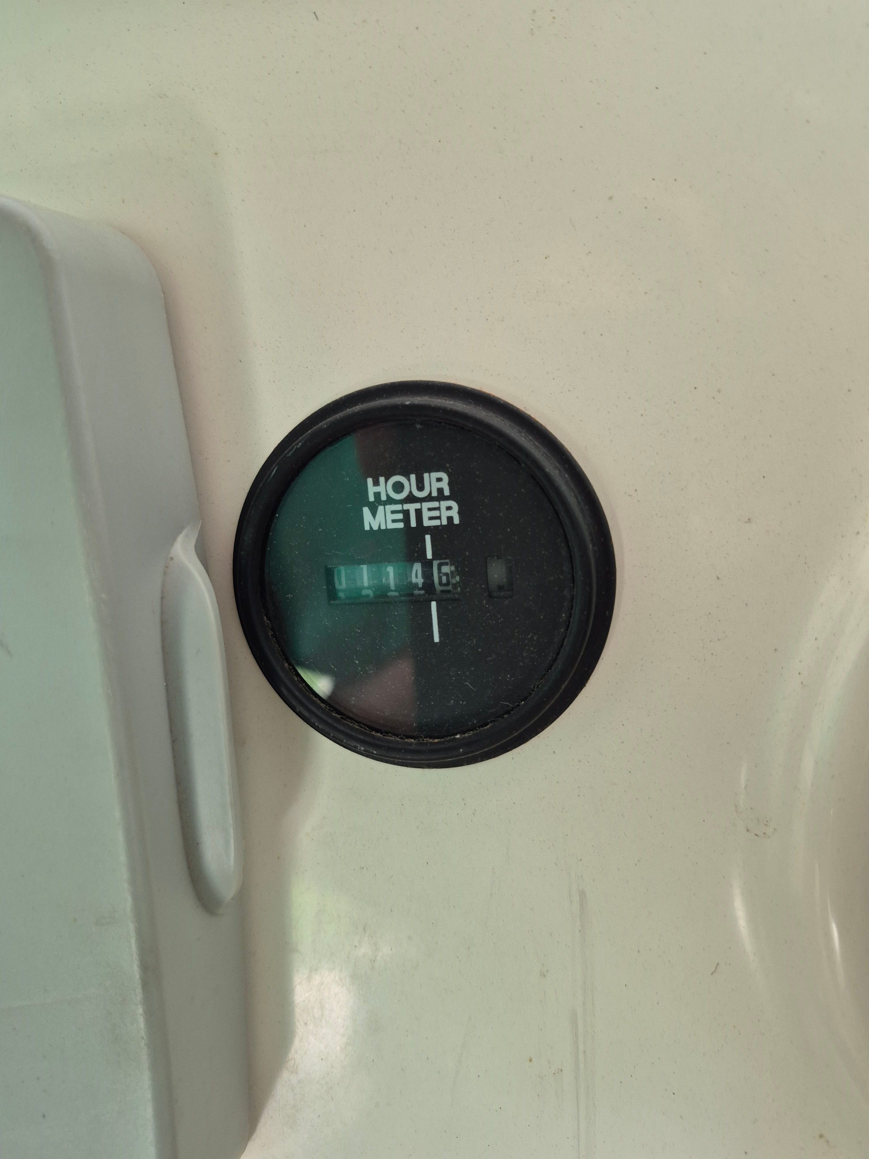 Hour meter on a boat panel showing 146 hours.