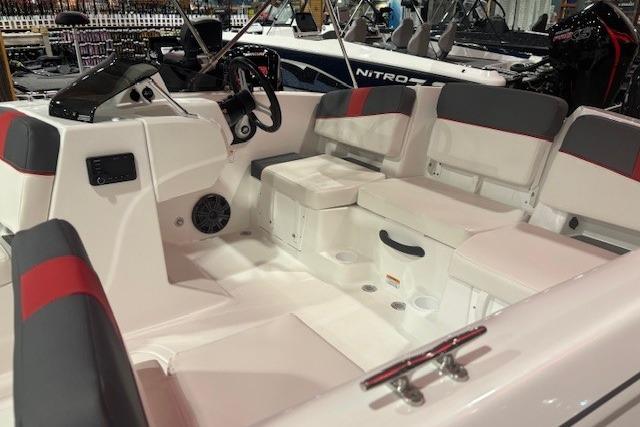 2026 Tahoe T18 boat interior with seating and steering console.