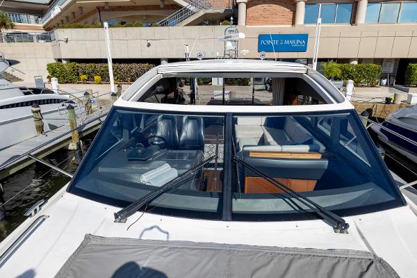 2013 Princess V57 yacht docked, front view.
