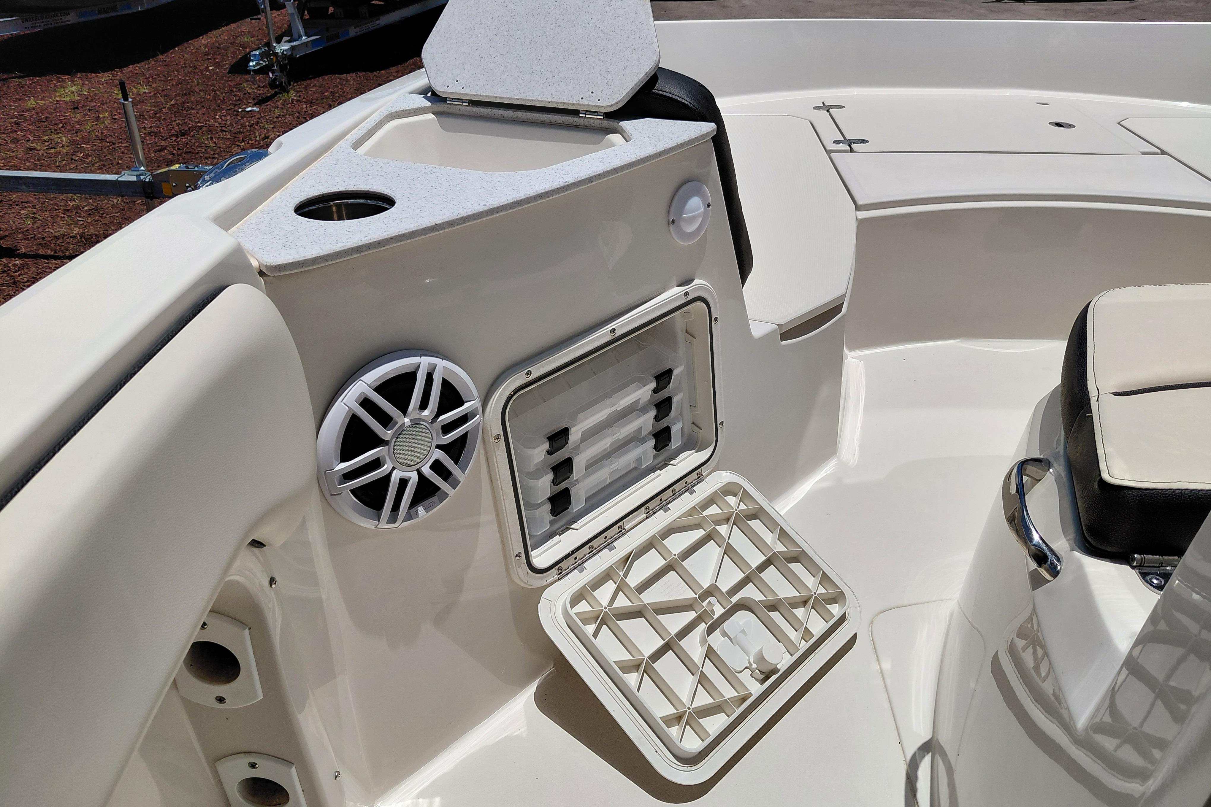 2023 Stingray 206 CC boat interior with speaker and storage compartment.