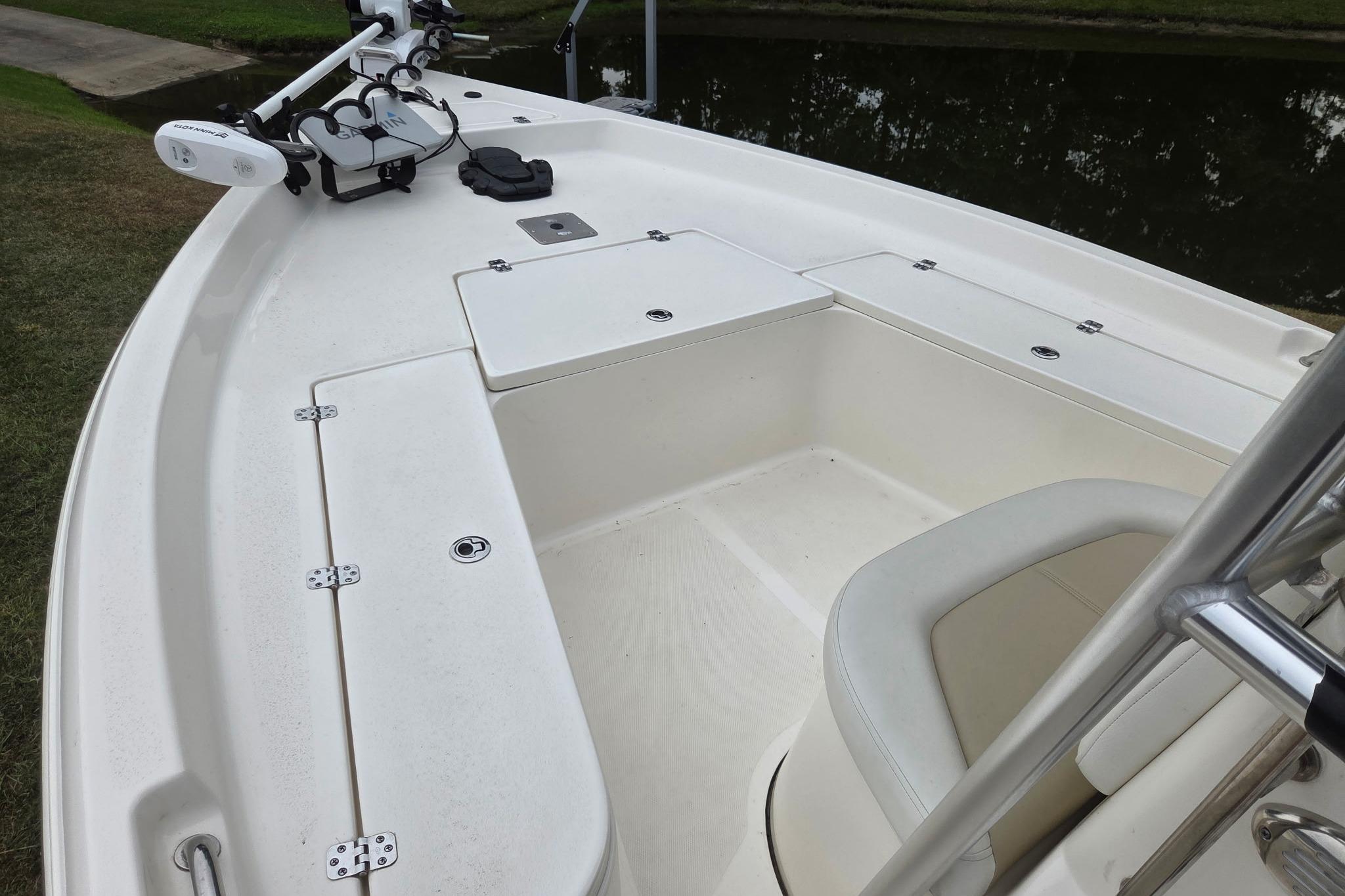 2023 Bulls Bay 2200 boat interior with seating and storage compartments.