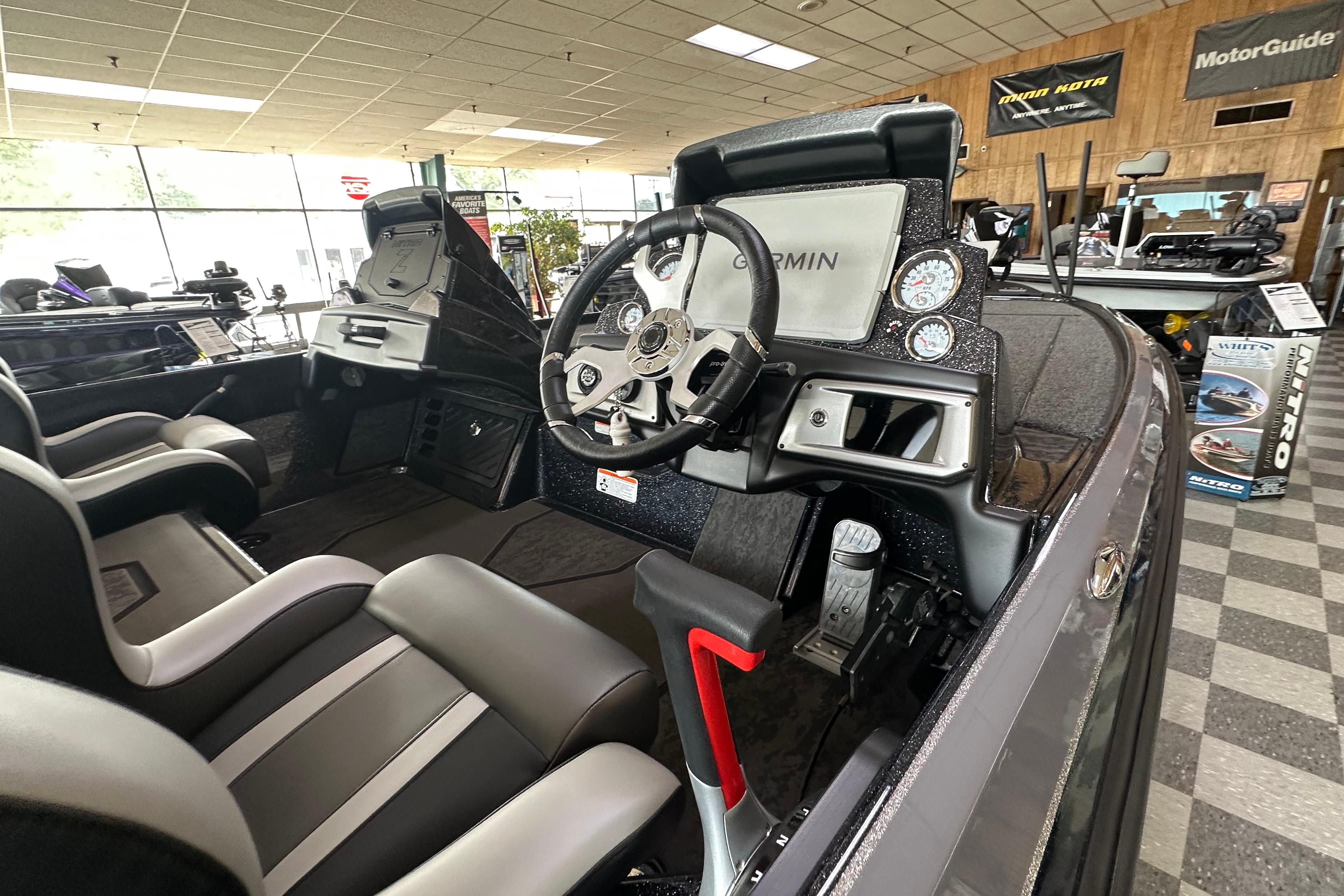 2025 Nitro Z20 XL Pro boat interior with Garmin dashboard and sleek seating.