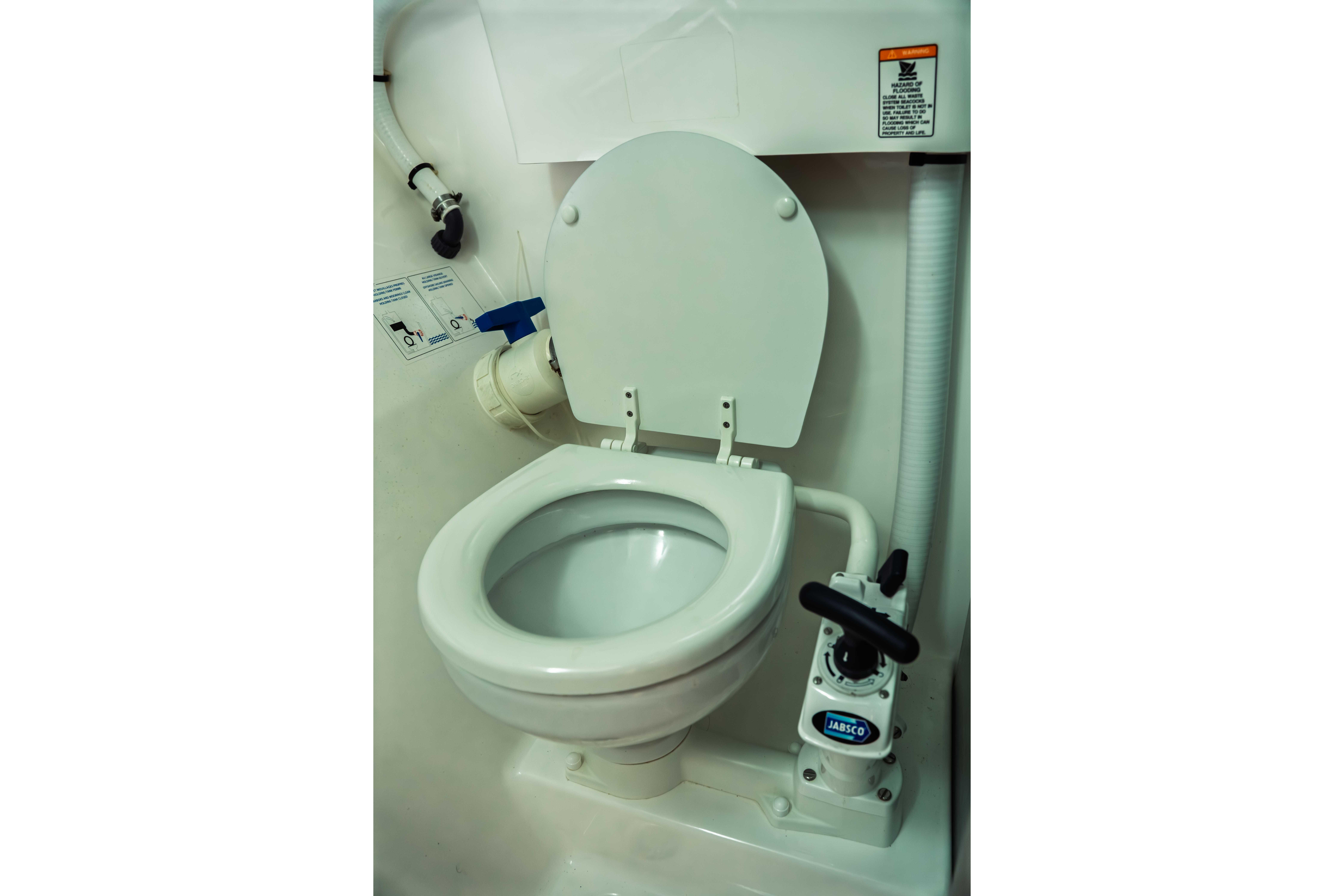 Marine toilet in 2005 Fountaine Pajot LAVEZZI 40 catamaran bathroom.