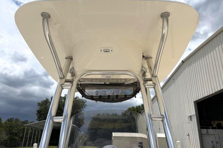 2023 Key West 203 FS boat with T-top and stainless steel supports.