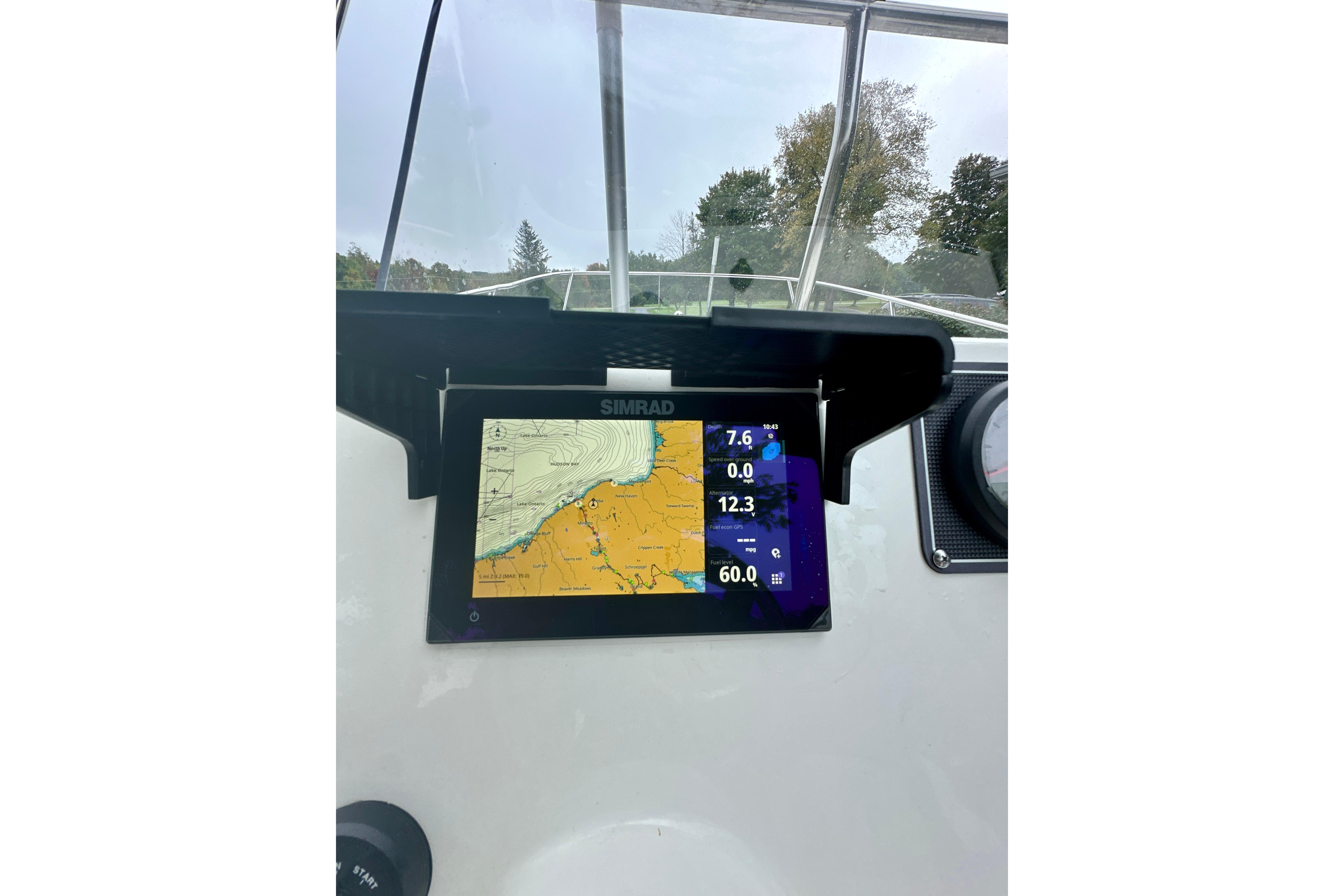 Simrad navigation display on 2024 Boston Whaler 170 Montauk boat dashboard.