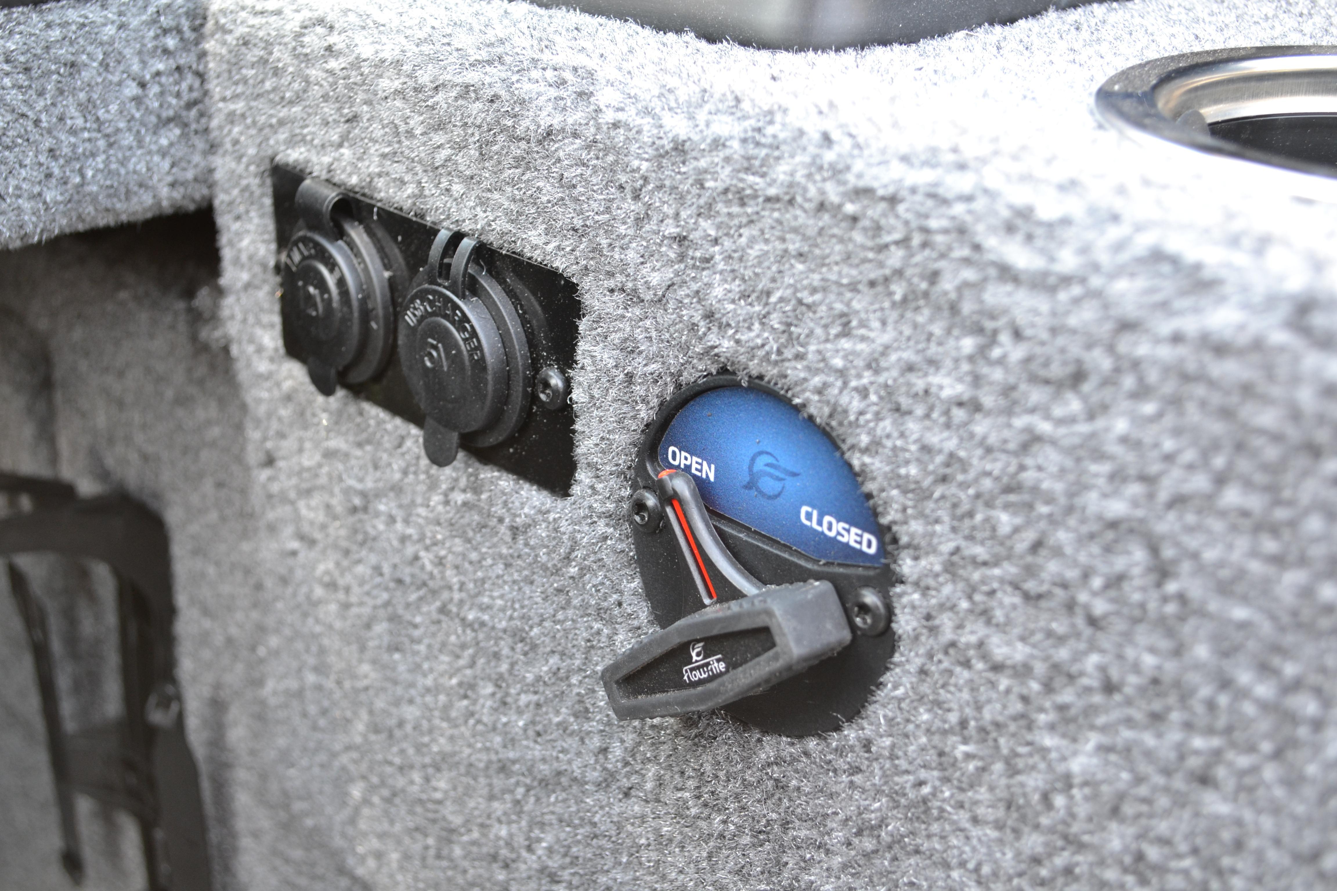 2026 Ranger VS1882SC Reata boat interior with power outlets and control switch.
