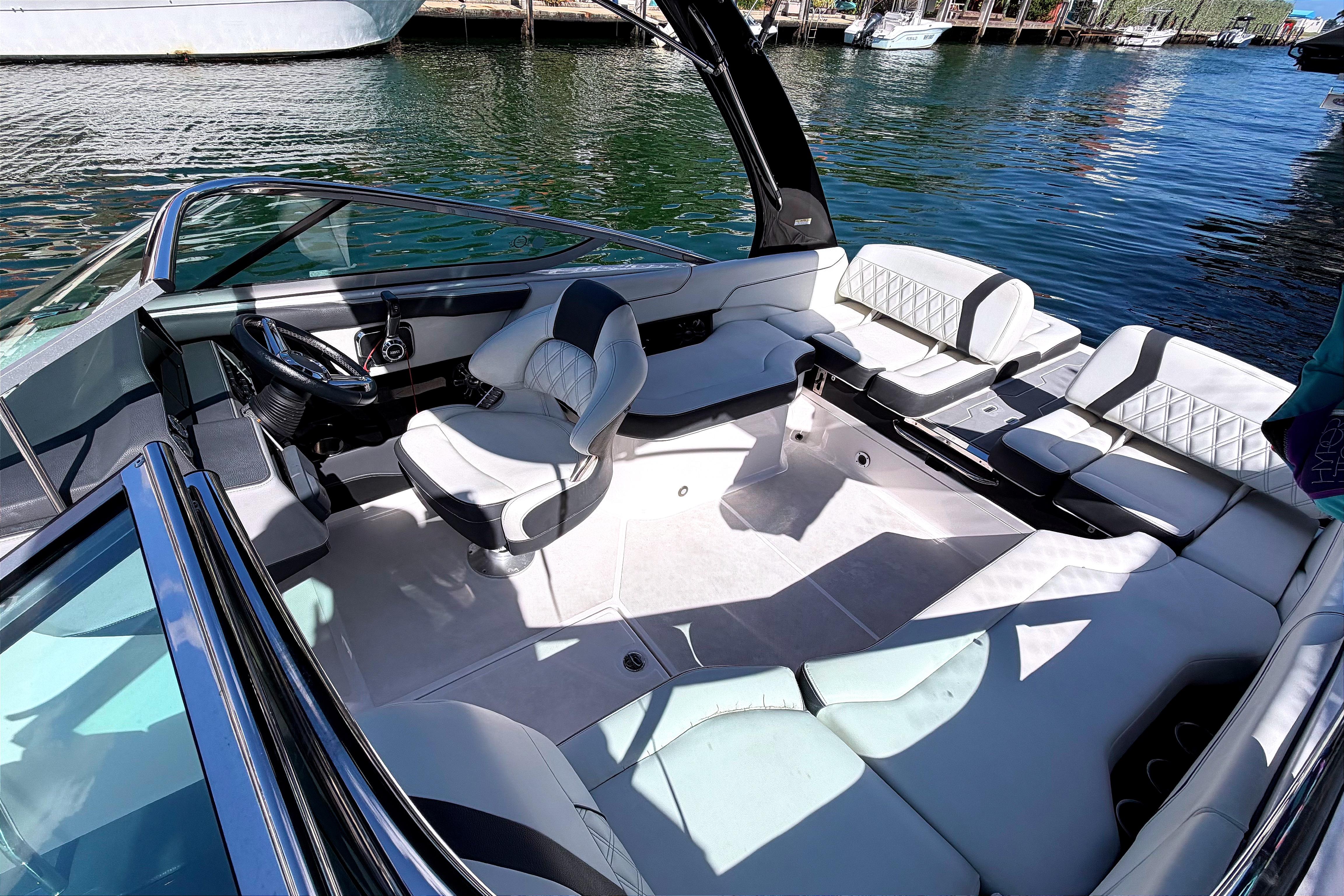 2020 Regal 2300 Bowrider interior with luxurious seating on a sunny day.