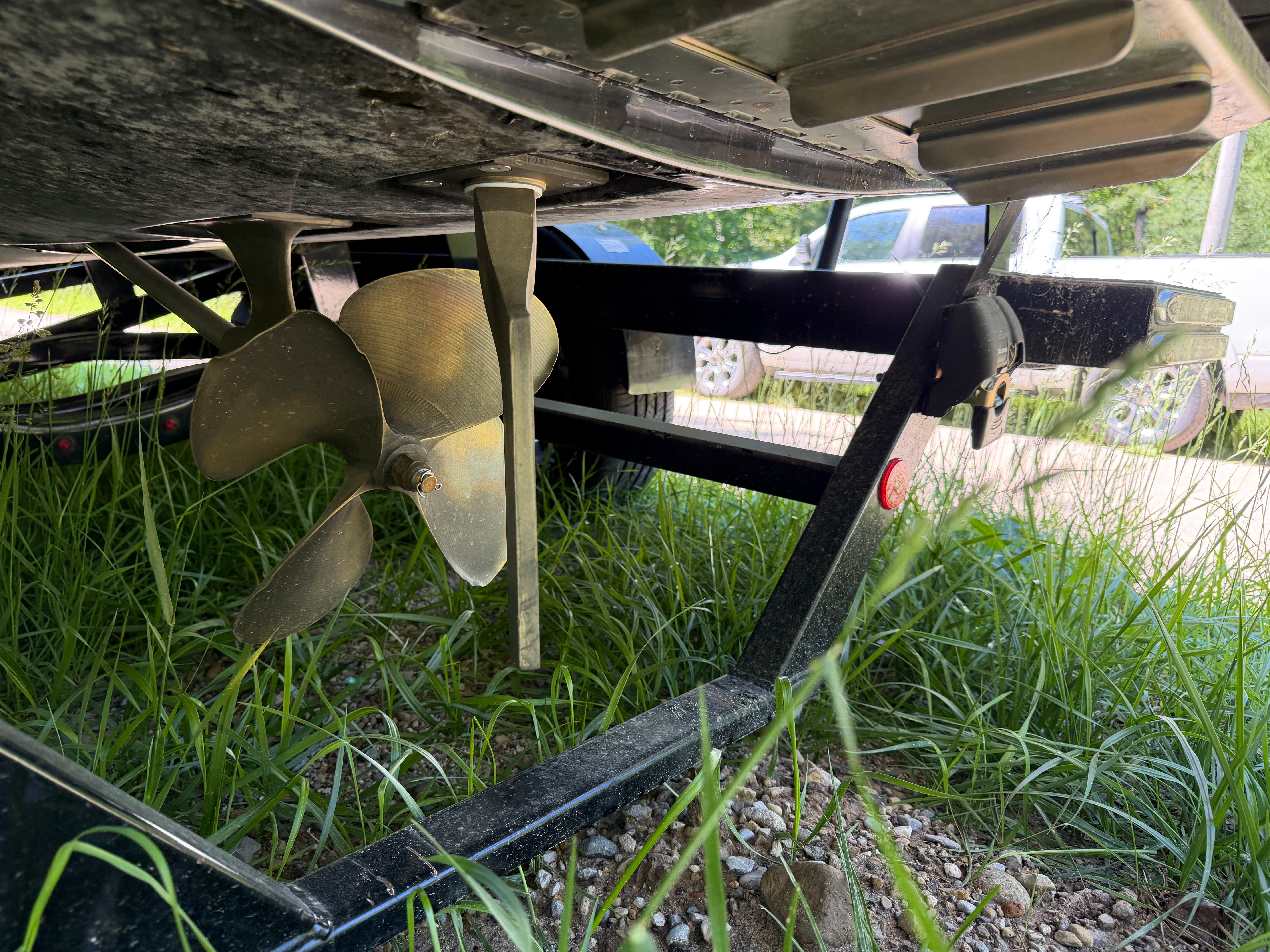 Underside of a 2013 MasterCraft X25 boat with propeller.