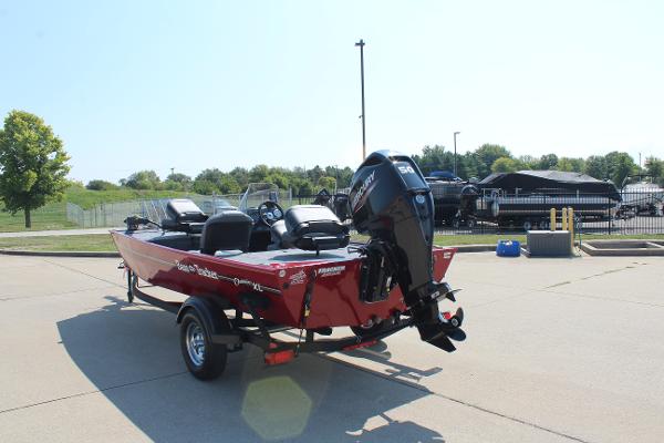 2025 Tracker Bass Tracker Classic XL boat on trailer, parked outdoors.
