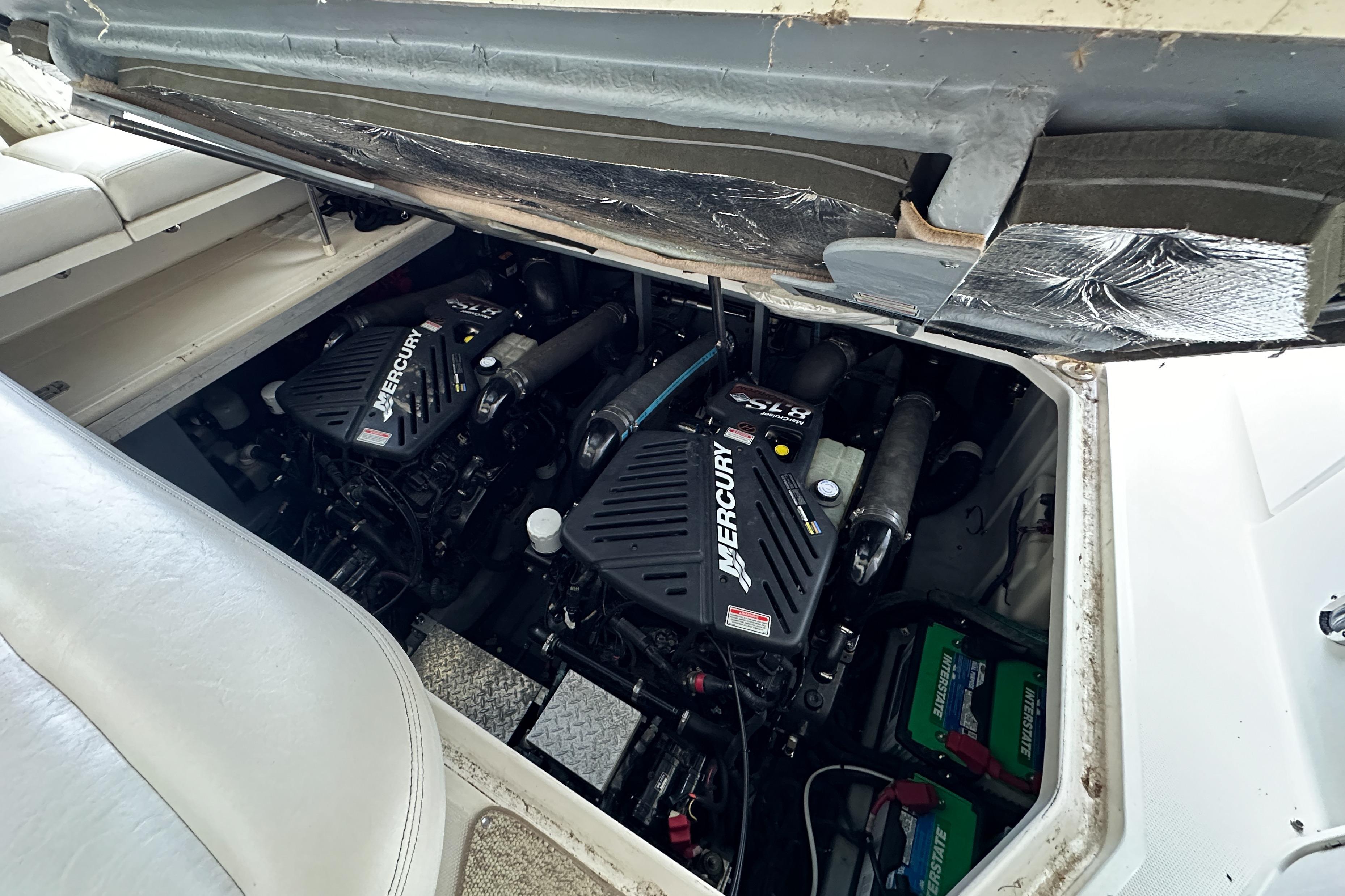 Engine compartment of a 2001 Sea Ray 410 Sundancer with twin Mercury engines.