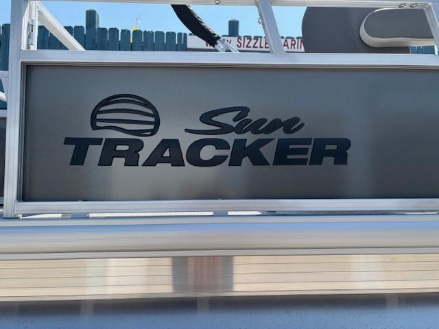 2026 Sun Tracker Bass Buggy 18 DLX logo on boat exterior.
