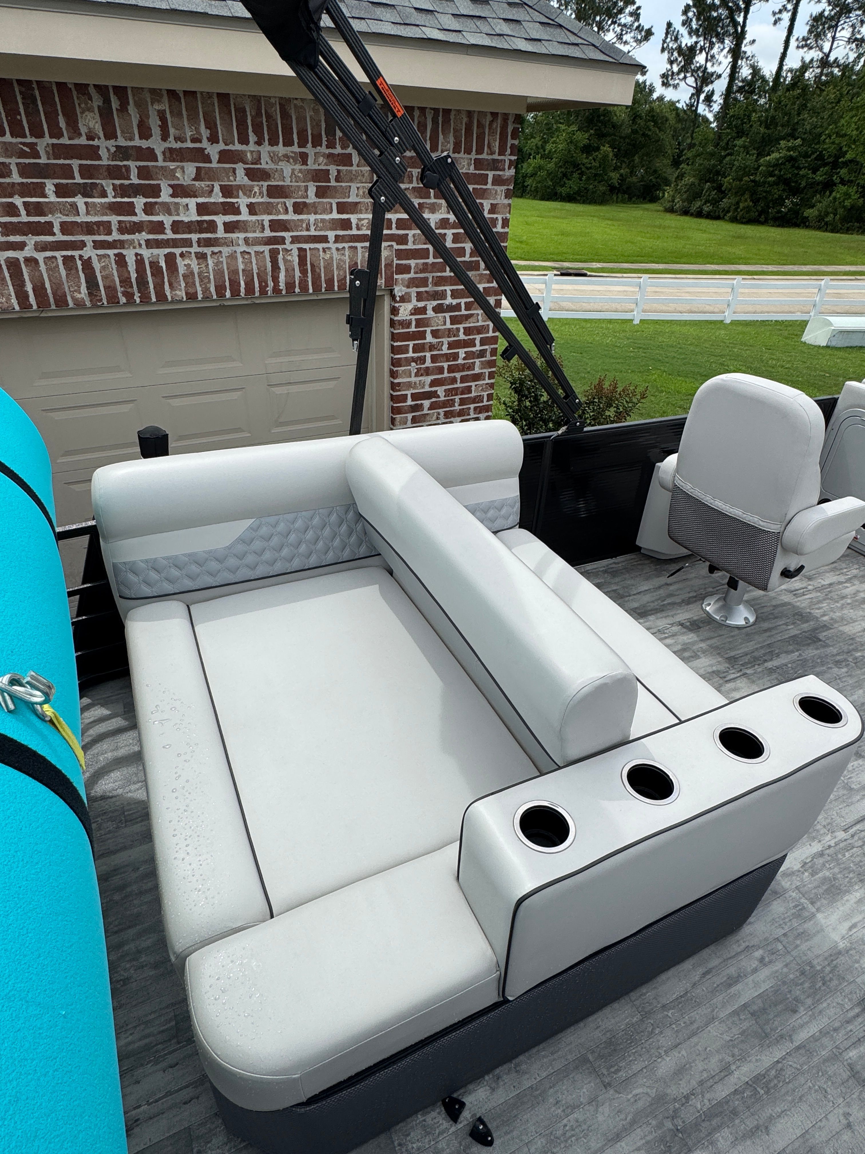 Crest Classic DLX 220 pontoon boat seating area, 2022 model.