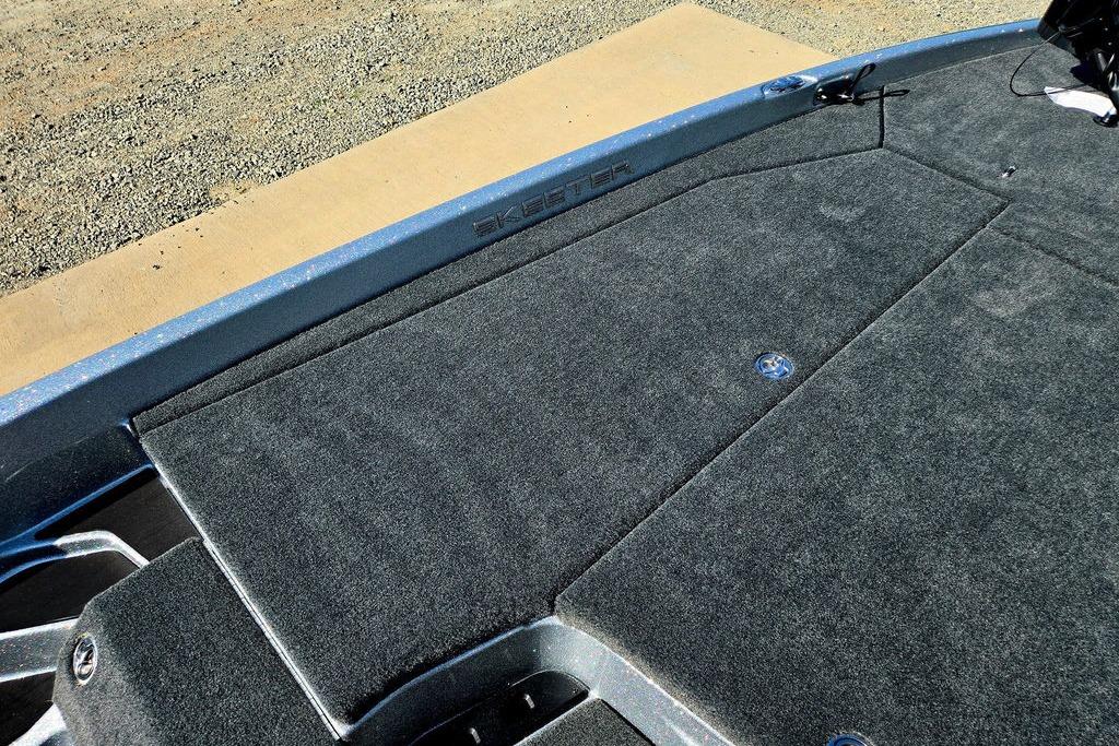 2026 Skeeter ZXE20 boat deck with gray carpet and storage compartments.