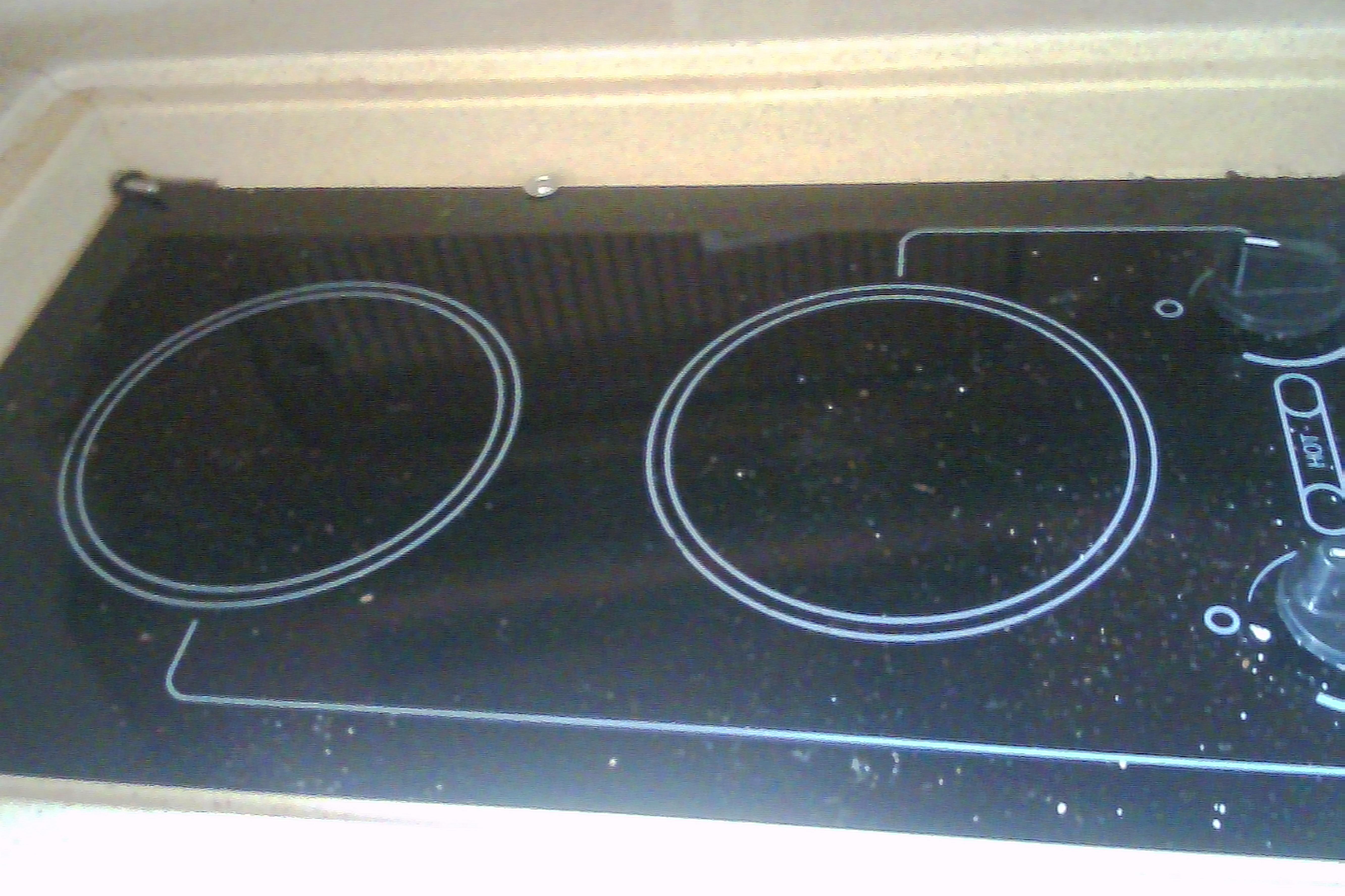Built-in stovetop on 2005 Sea Ray 300 Sundancer yacht kitchen.