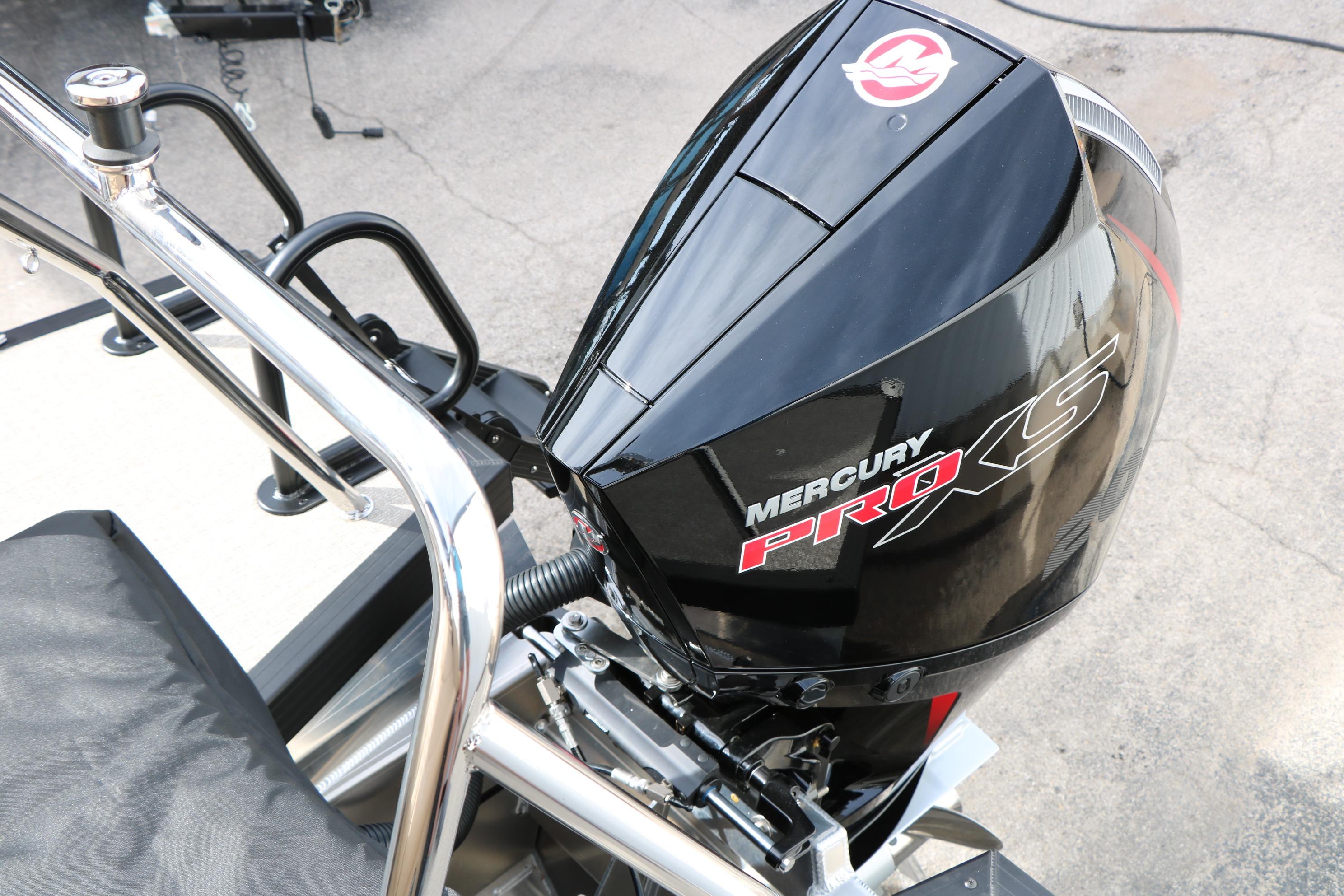 ```markdown Mercury Pro XS engine on 2026 Evotti 523CS boat, showcasing sleek design. ```