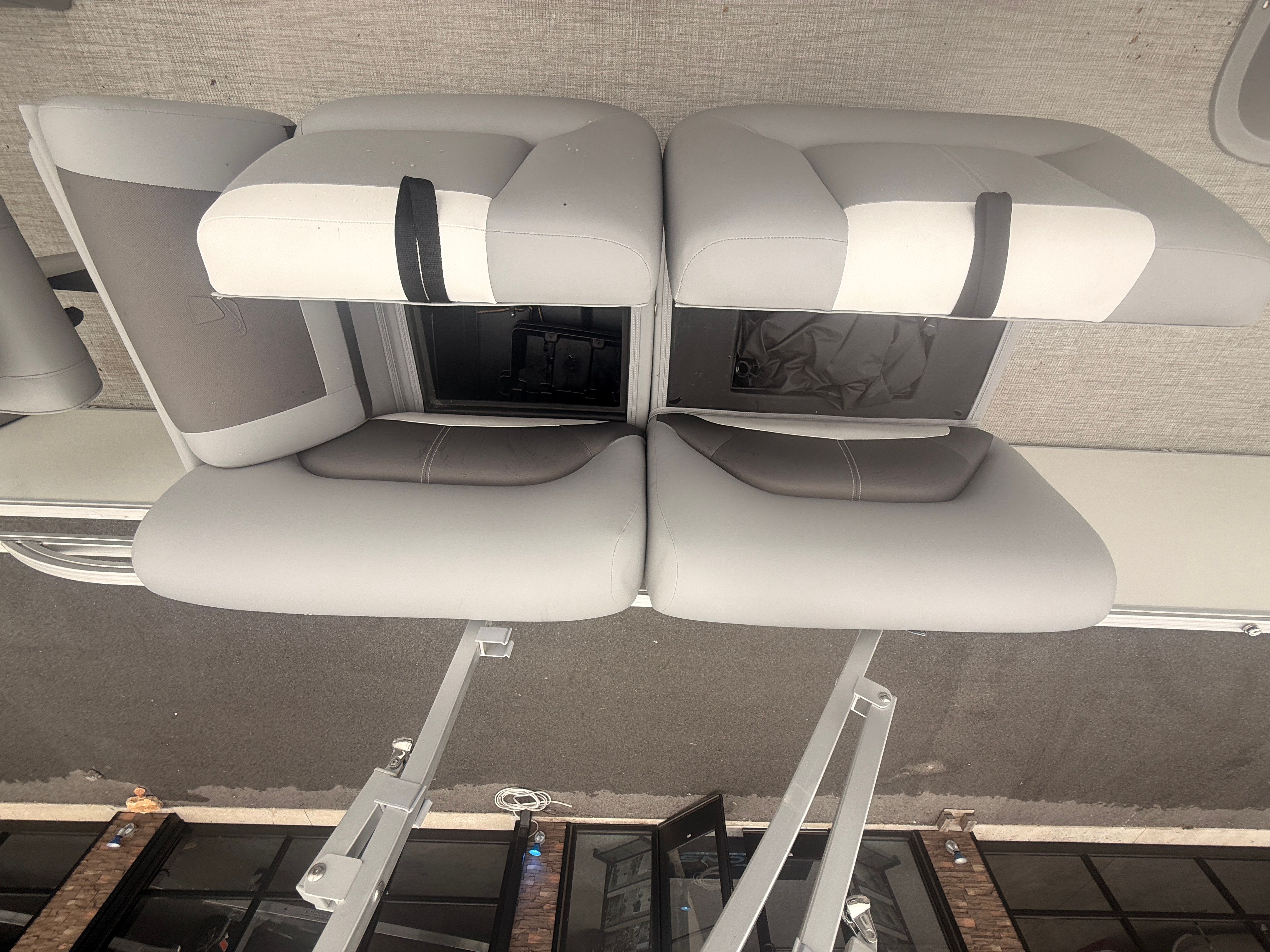 Interior view of 2026 Landau Alure 23CC Fish with gray seating.