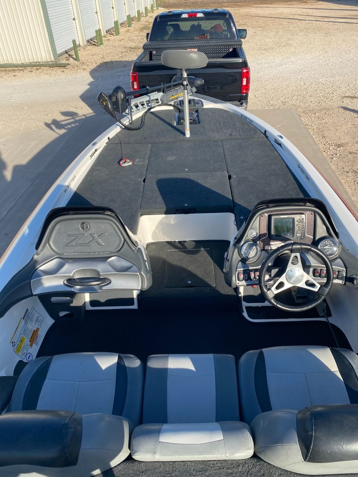 Interior view of a 2012 Skeeter ZX20 boat with steering console.