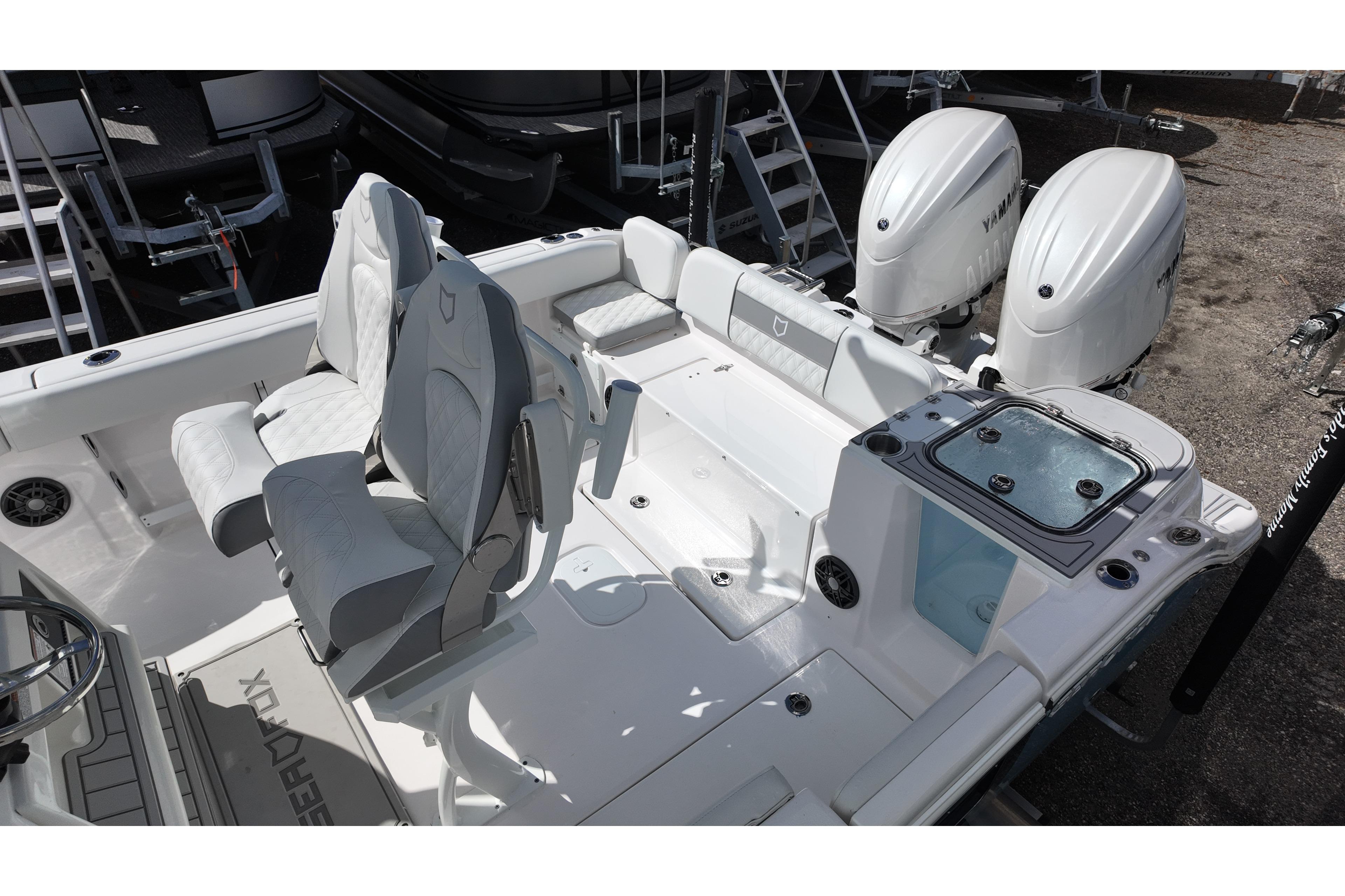 2026 Sea Fox 268 Commander boat interior with dual seats and twin outboard engines.