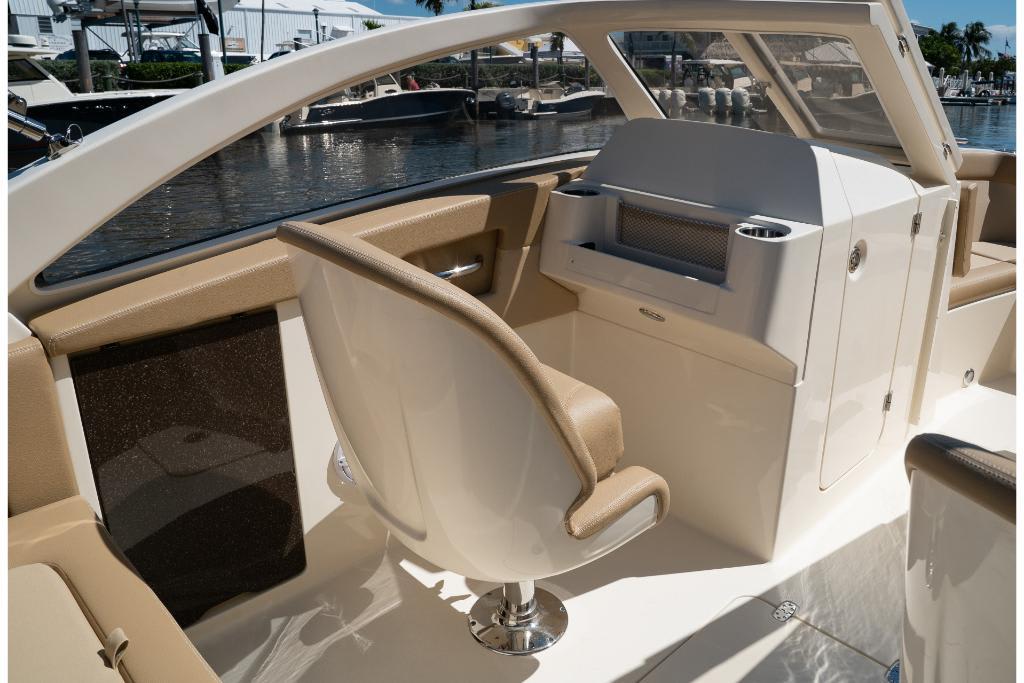2023 Scout 240 Dorado boat interior with helm seat and console.