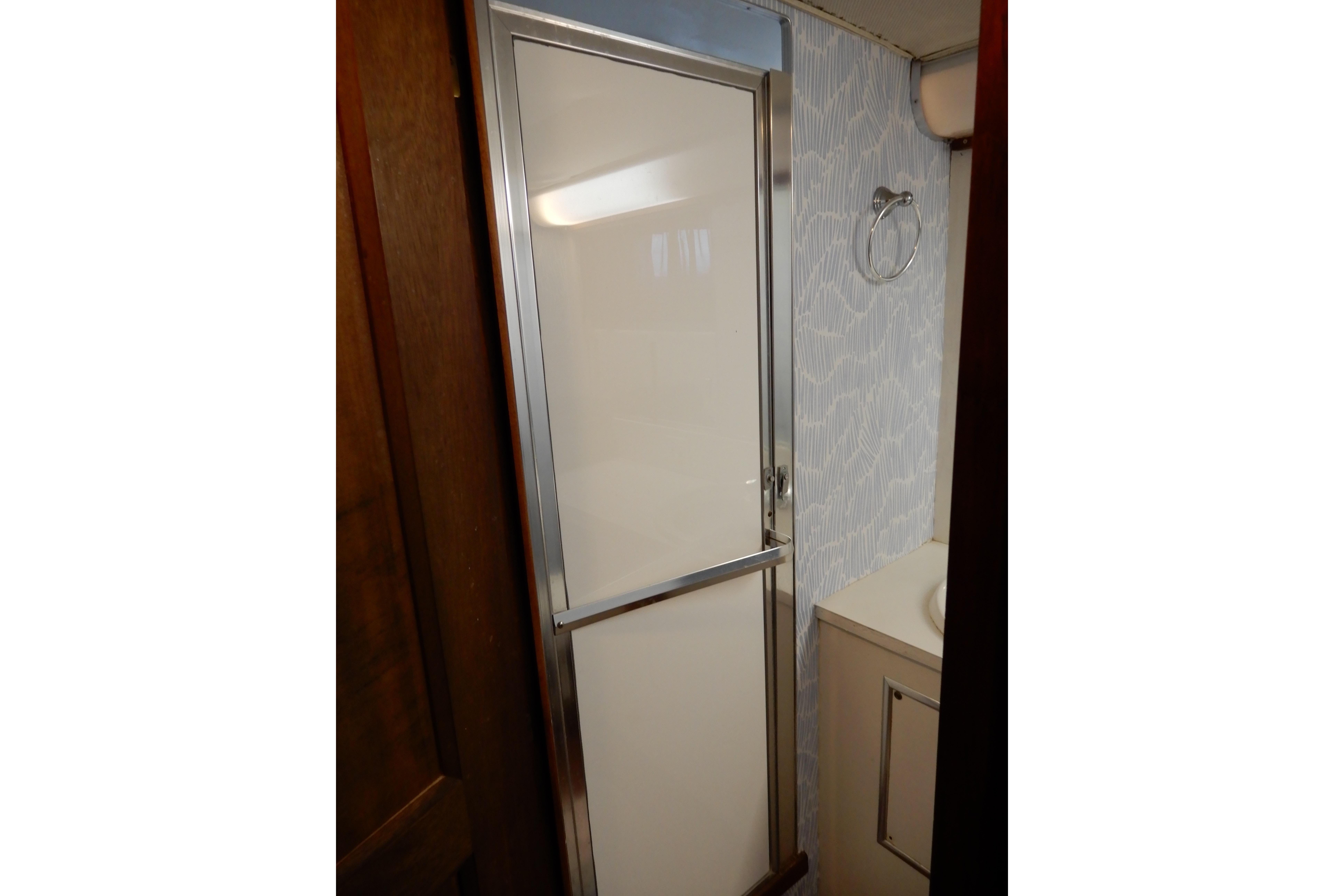 1974 Hatteras 53 Motor Yacht bathroom with shower and sink.