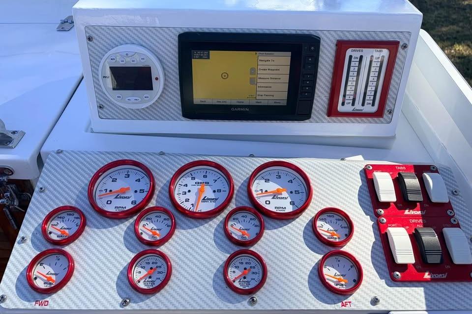 Dashboard of a 1983 Cigarette 24' Classic boat with gauges and controls.